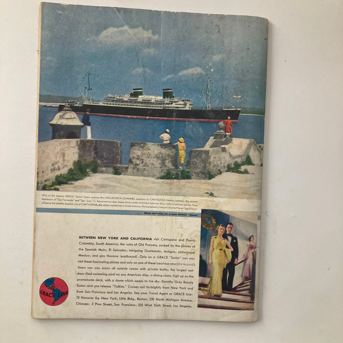 Back cover of VTG New Outlook Magazine December 1934 Winning a Government 'A', showcasing a vintage cruise advertisement featuring a ship in Cartagena, Colombia, and a glimpse of coastal life.