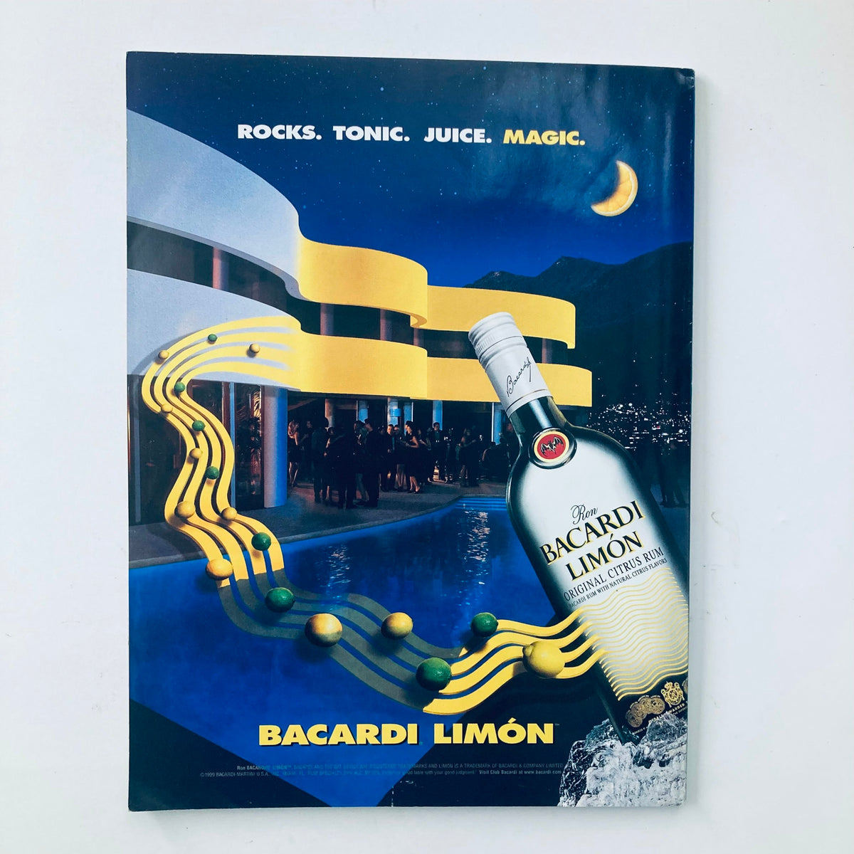 An advertisement from Playboy Magazine August 1999 for Bacardi Limón, featuring vibrant colors and a design highlighting relaxation and social enjoyment.