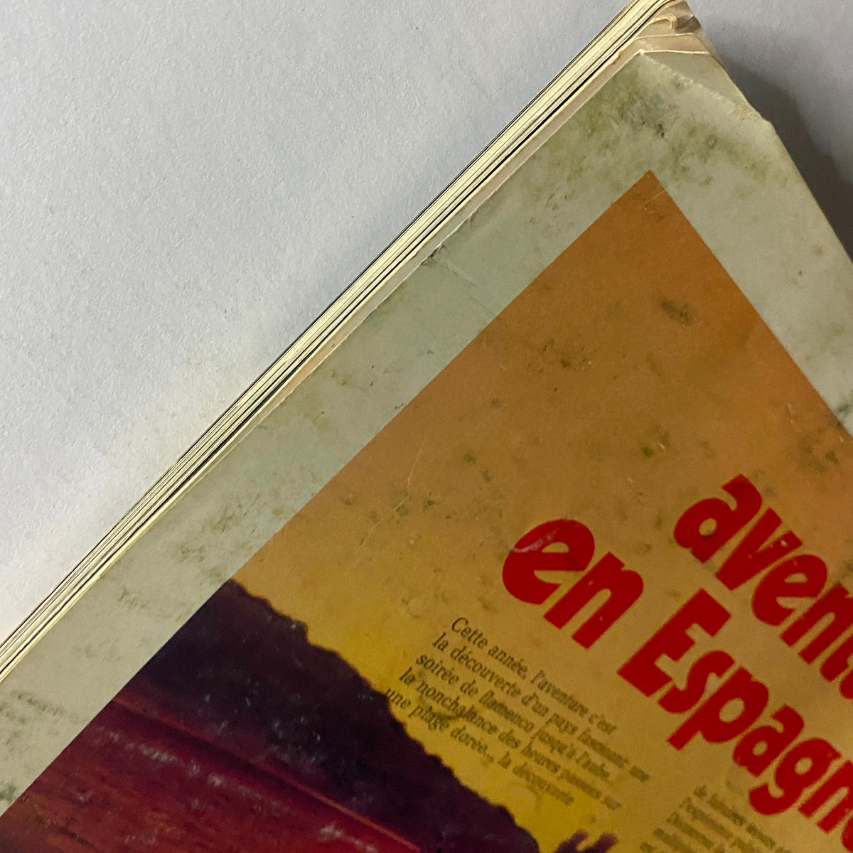 Vogue Paris Magazine February 1972 Catherine Deneuve Cover featuring a close-up of the vintage advertisement for Spain, highlighting travel and tourism themes.