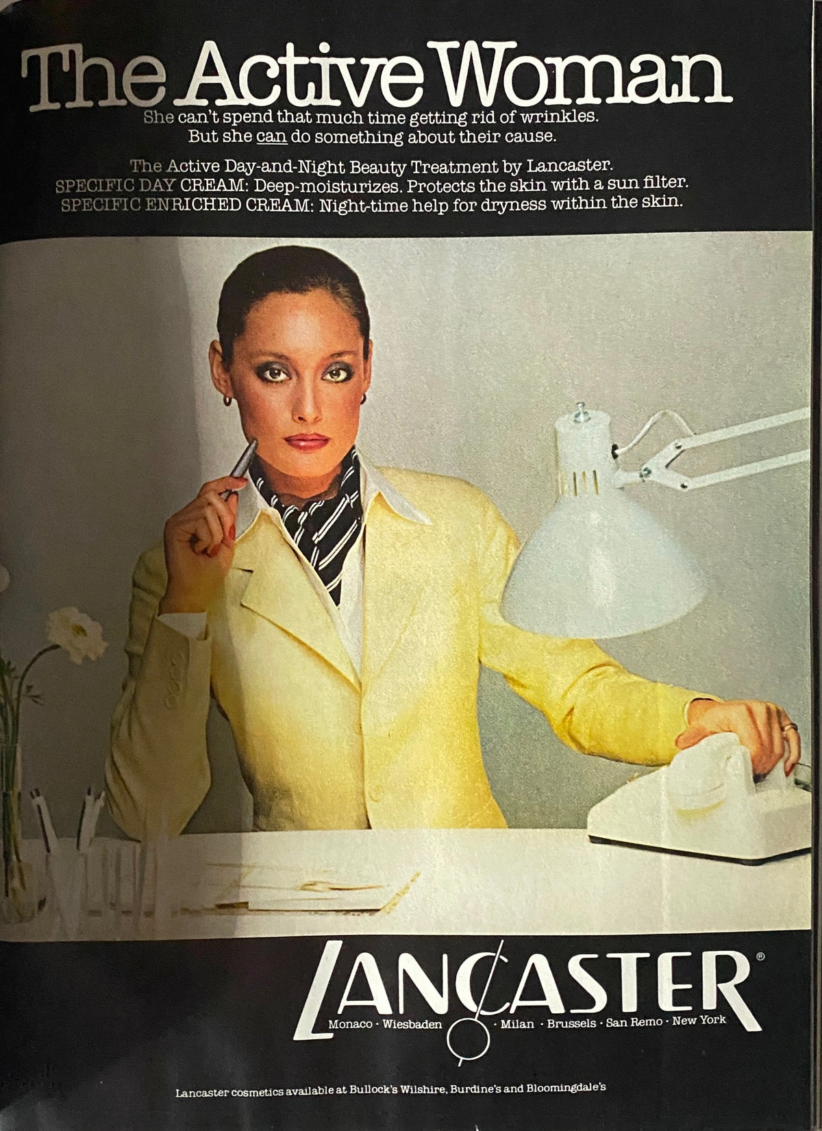 Vogue Magazine November 1978 showcasing an advertisement for Lancaster cosmetics, portraying a confident woman in a stylish outfit, reflective of the era's beauty standards.
