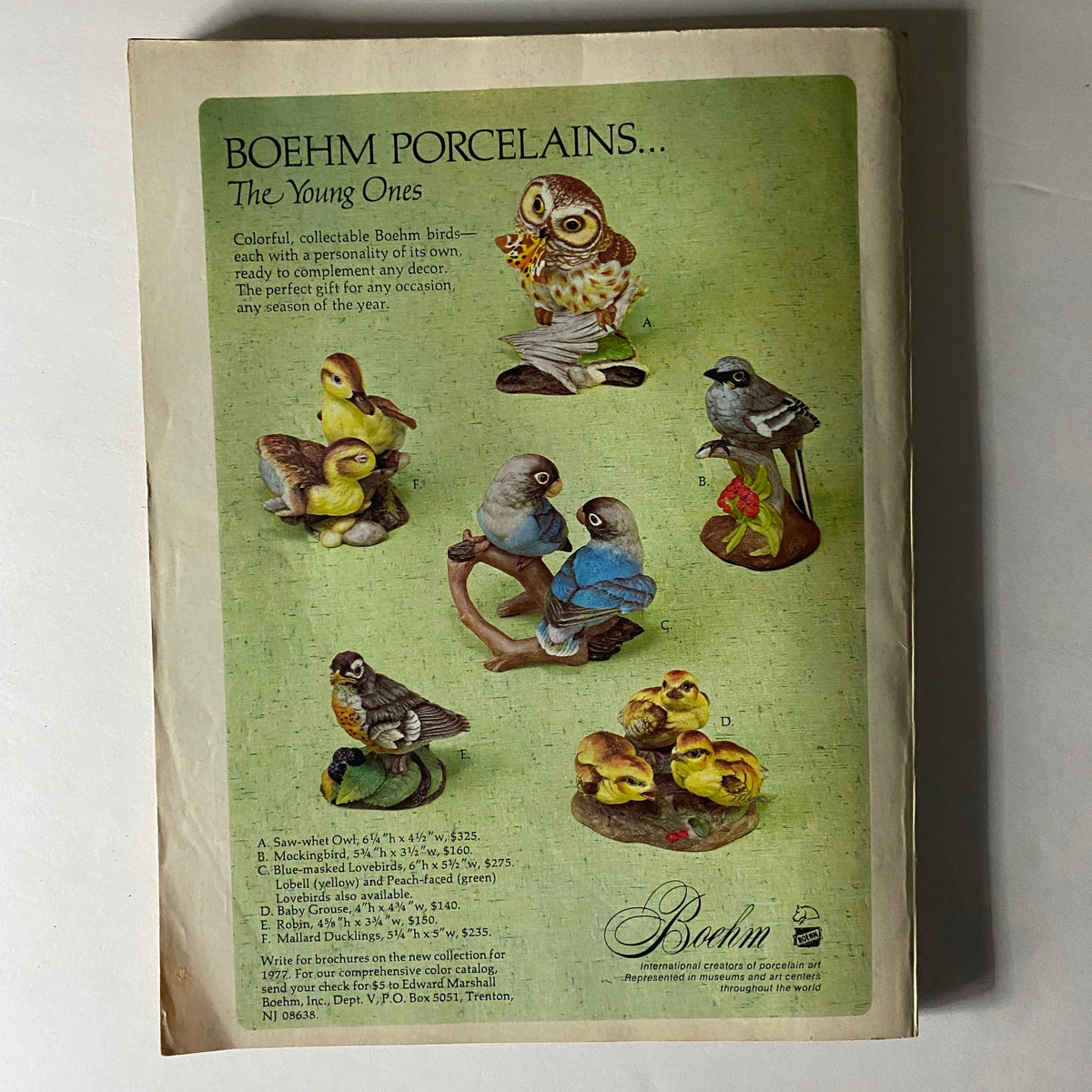 Boehm Porcelains advertisement from Vogue Magazine June 1977, featuring collectible porcelain birds, promoting decorative items suitable for various occasions.
