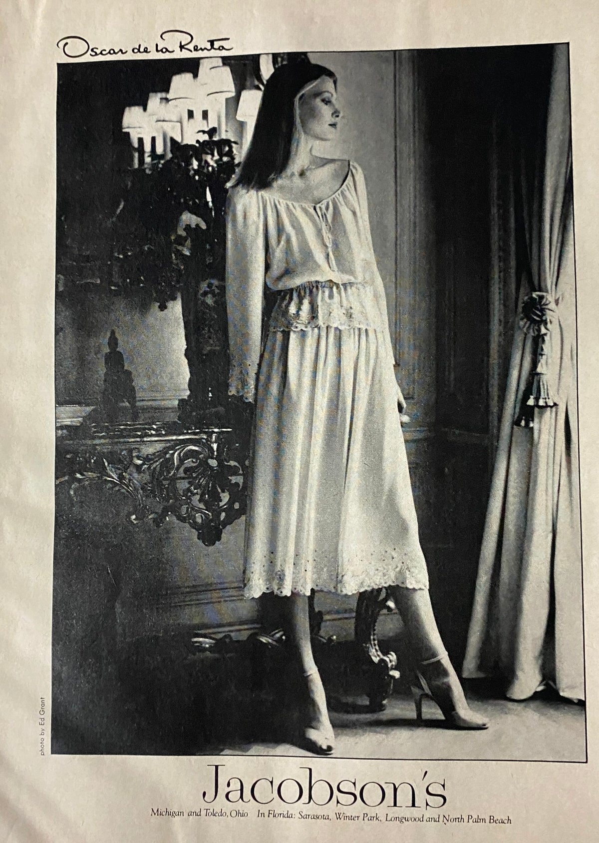 Vogue Magazine January 1978 featuring a black-and-white advertisement by Oscar de la Renta showcasing a model in a stylish white outfit, highlighting fashion trends of the late seventies.