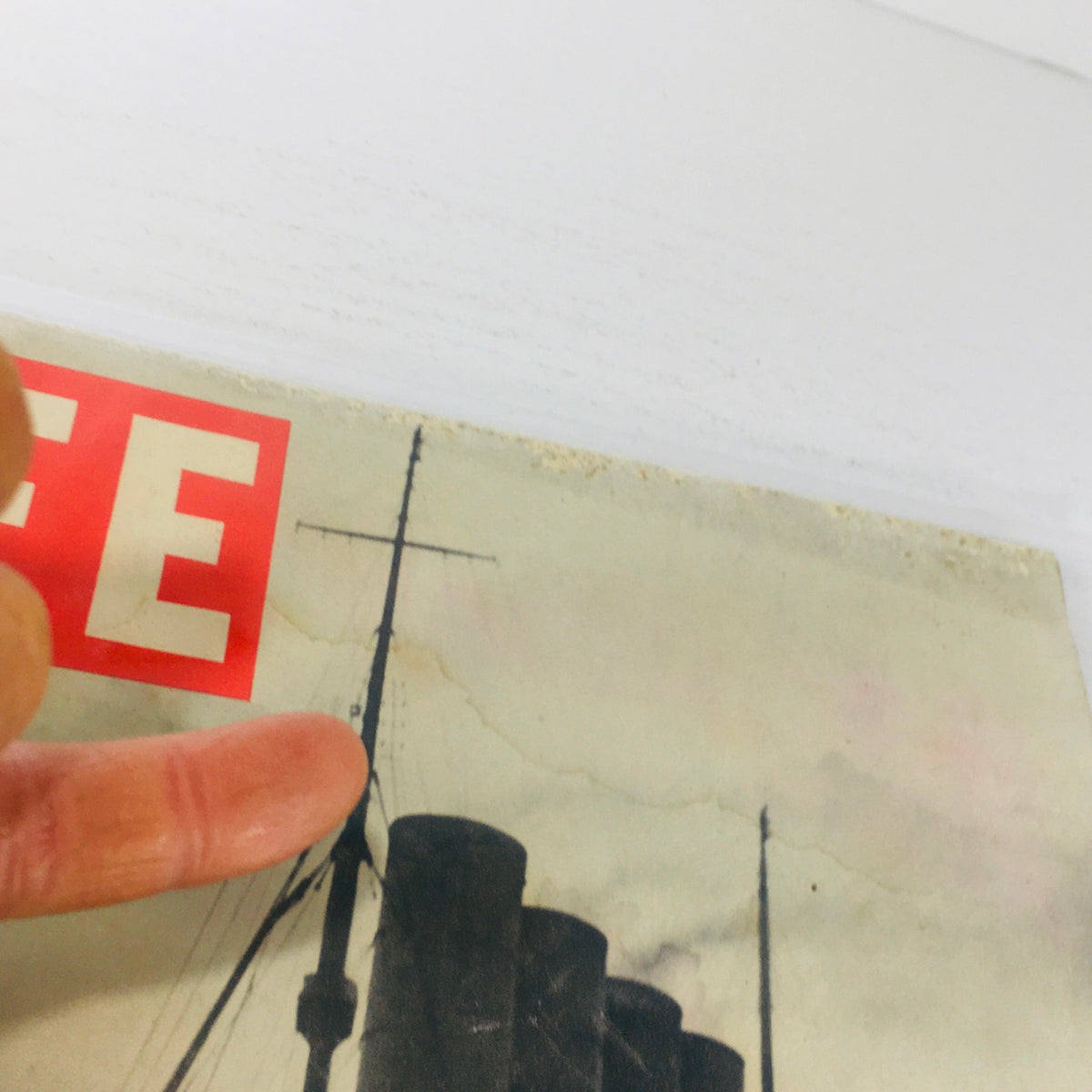 Top view of the Vintage Life Magazine cover dated July 27, 1942, displaying the magazine's age and historical significance.