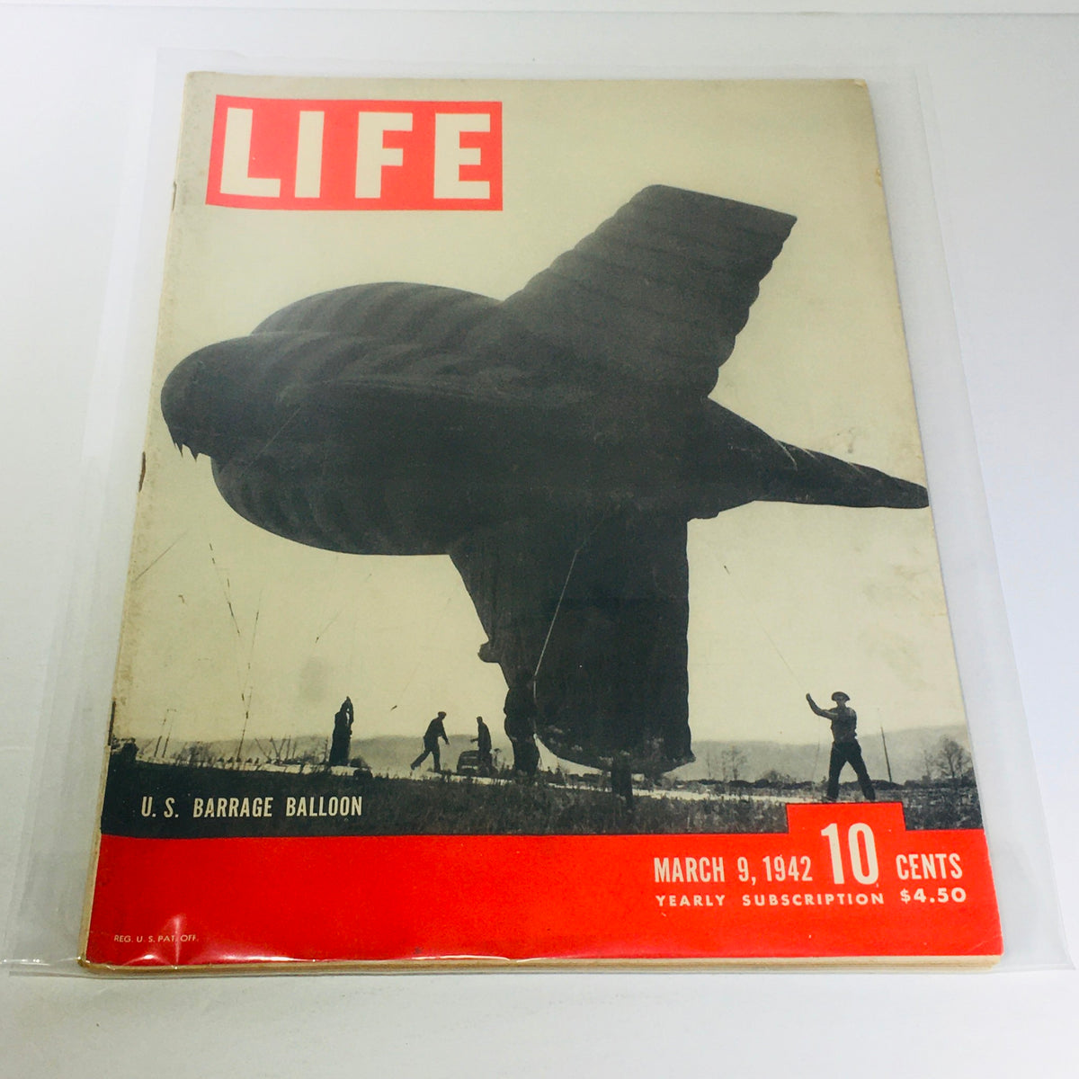 Vintage Life Magazine: March 9, 1942 cover showcasing U.S. Barrage Balloon, featuring a striking image of men handling a barrage balloon in a historic moment during World War II.