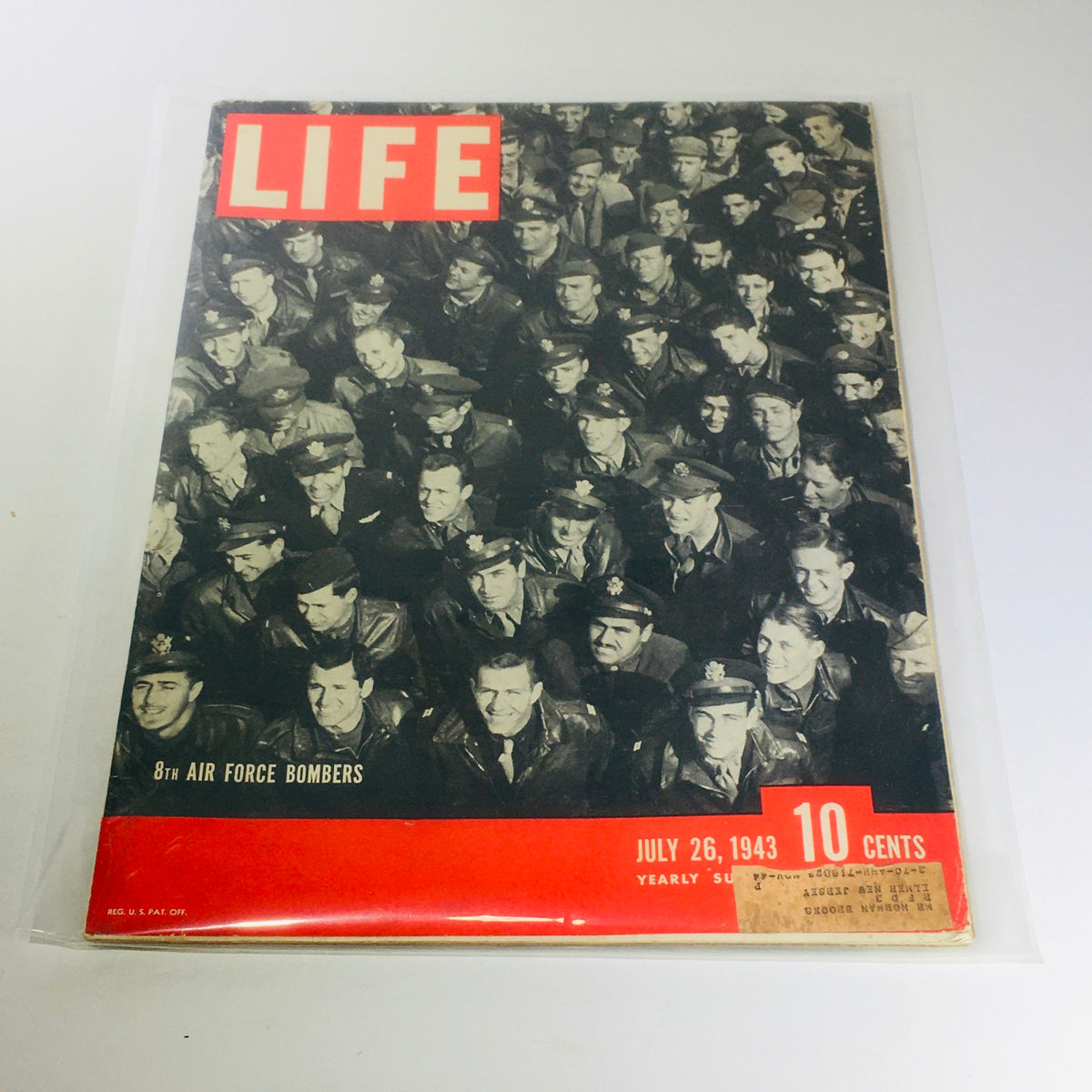 Vintage Life Magazine cover from July 26, 1943, featuring 8th Air Force Bombers and soldiers in military uniforms, showcasing a historic moment from World War II.