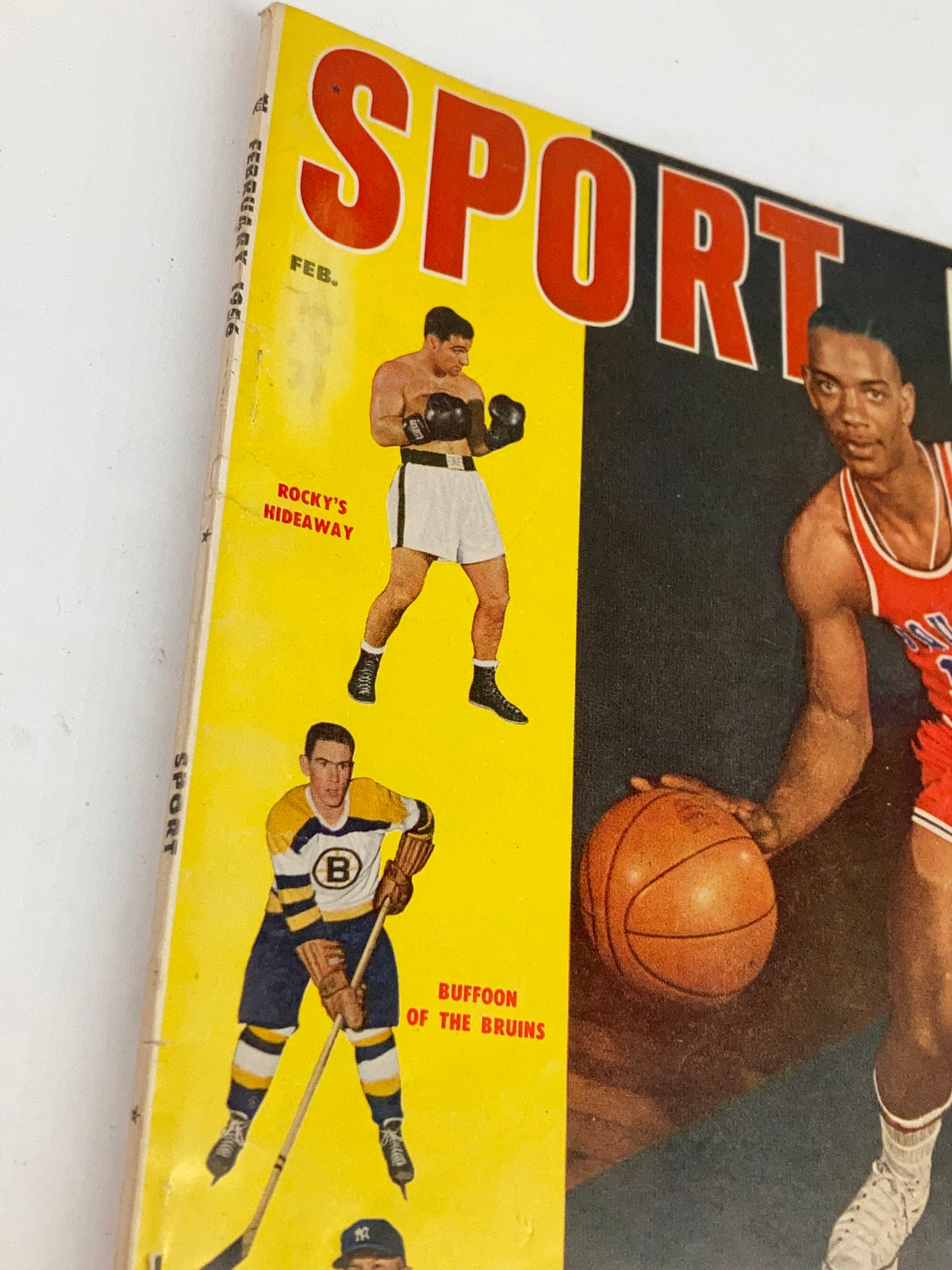 Side view of the VTG Sport Magazine February 1956 Volume 21 cover showcasing additional content including 'Rocky's Hideaway' and 'Buffoon of the Bruins'.