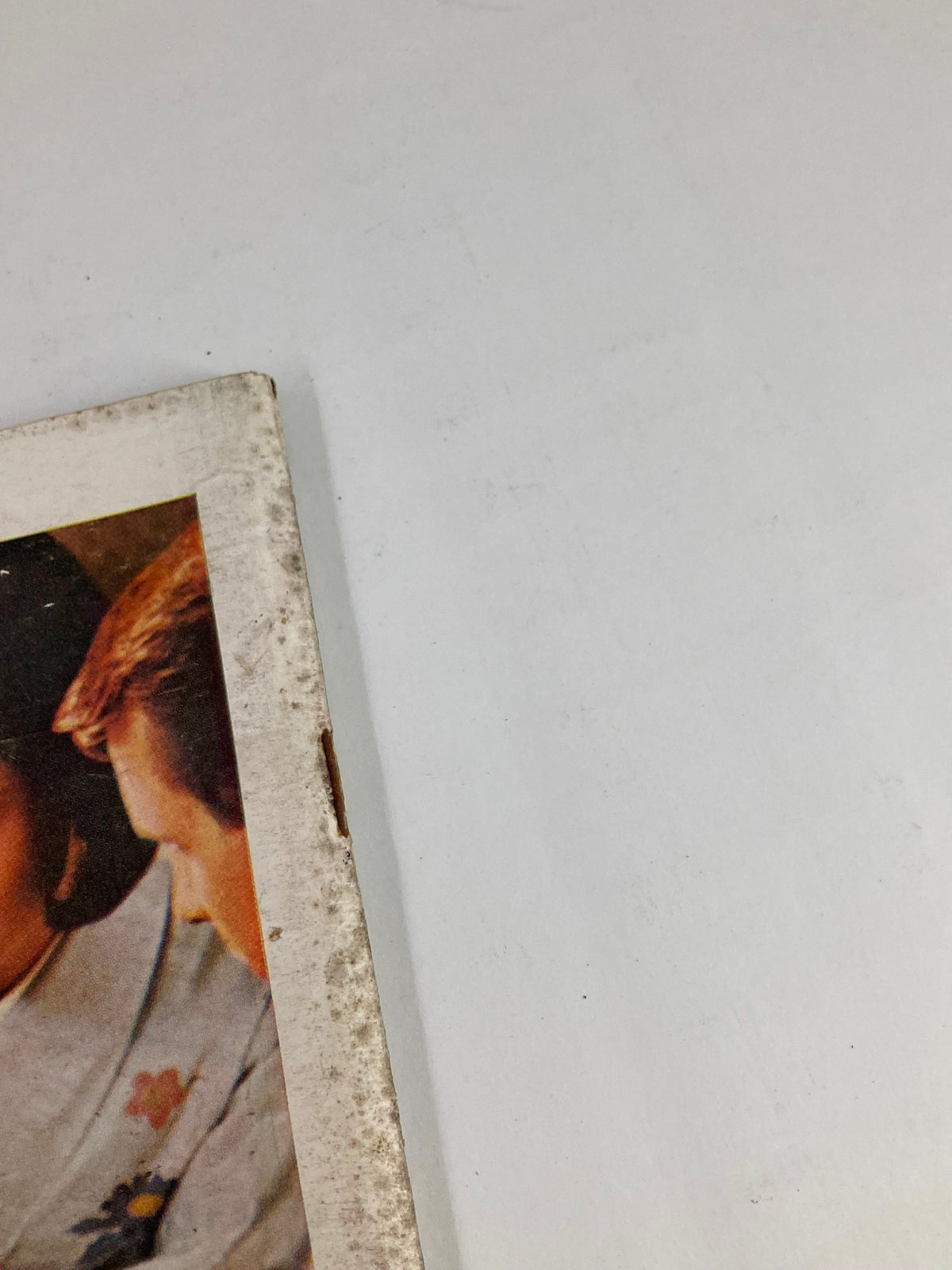 Close-up view of the cover edge of The New Yorker Full Magazine January 25 1969, featuring vintage artwork and indications of wear, showcasing its historical significance and charm.