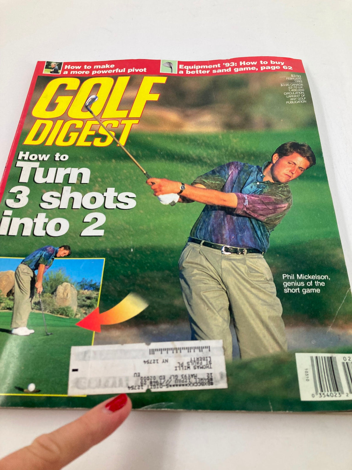 Close-up view of the cover of Golf Digest Magazine February 1993 Vol 44 #2, highlighting Phil Mickelson and the article title 'How to Turn 3 Shots into 2.' The cover presents nostalgic elements of golf culture in the early 1990s.