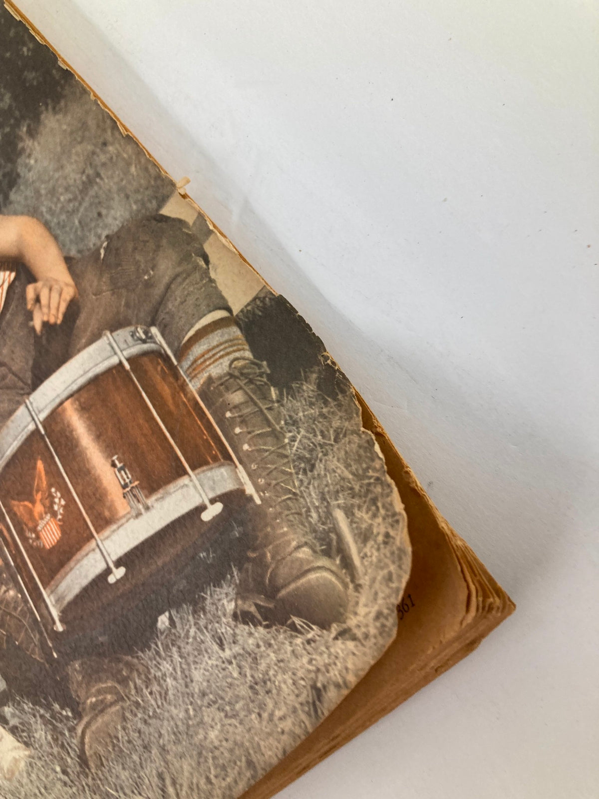 Detailed view of a young drummer with a vintage drum set featured in the July 1946 ETUDE The Music Magazine, showcasing the musical culture of the era.