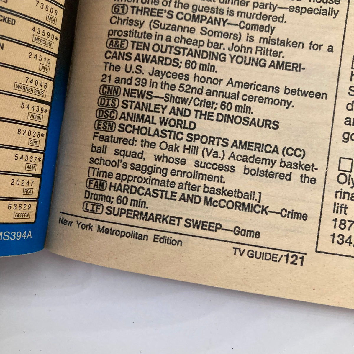 Interior page of TV Guide Magazine March 3, 1990 featuring a schedule of television programs, including 'Supermarket Sweep' and 'Three's Company,' capturing early 90s television culture.