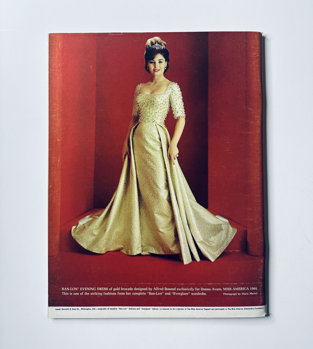 Miss America Pageant Magazine September 7–13, 1964 featuring Donna Axum from New Jersey. The cover showcases a glamorous evening gown designed by Alfred Fiandaca, highlighting the elegance and style of the 1964 pageant.