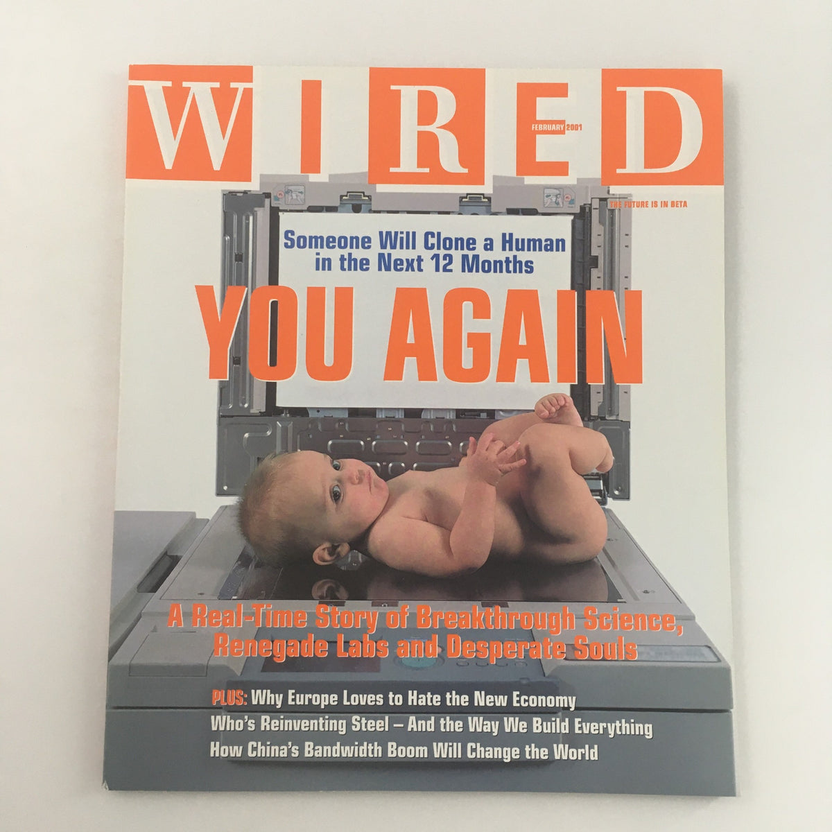 Wired Magazine February 2001 Cover featuring a baby in a futuristic setting with the headline 'Someone will Clone a Human in the Next 12 Months'. This edition presents a real-time story of breakthrough science, renegade labs, and desperate souls.