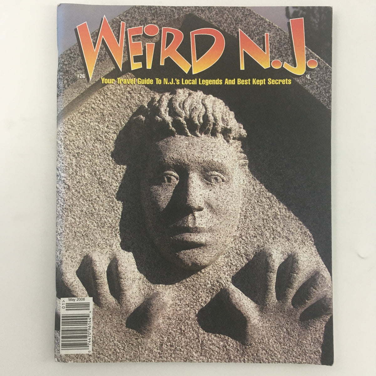 Cover of Weird N.J. Magazine May 2006, Issue #26, featuring a stone sculpture of a face with hands, highlighting local legends and secrets of New Jersey.