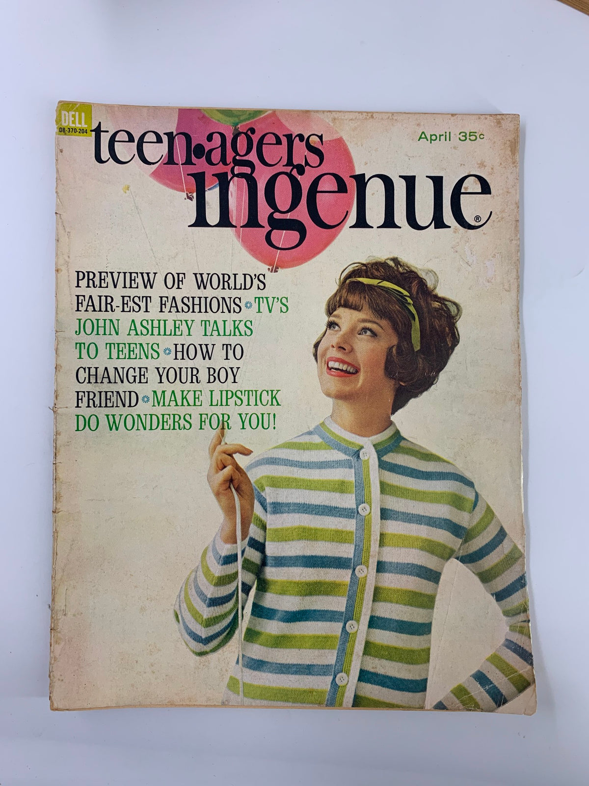 Cover of VTG Teen-Agers Ingenue Magazine April 1962 featuring a cheerful young woman wearing a striped cardigan, with text highlighting articles like 'John Ashley Talks to Teens' and fashion predictions.