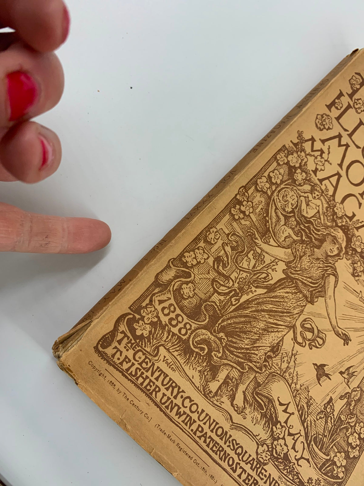 Close-up view of the spine of The Century Illustrated Magazine May 1888 showcasing its vintage style and condition.