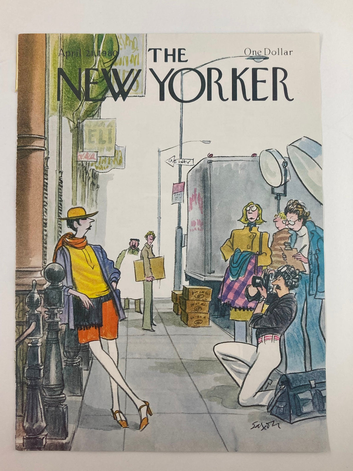 Cover of The New Yorker April 21, 1980, showcasing street photography by Charles Saxon. The image highlights a lively street scene with stylish characters, including a woman in a fashionable outfit and photographers capturing the moment.