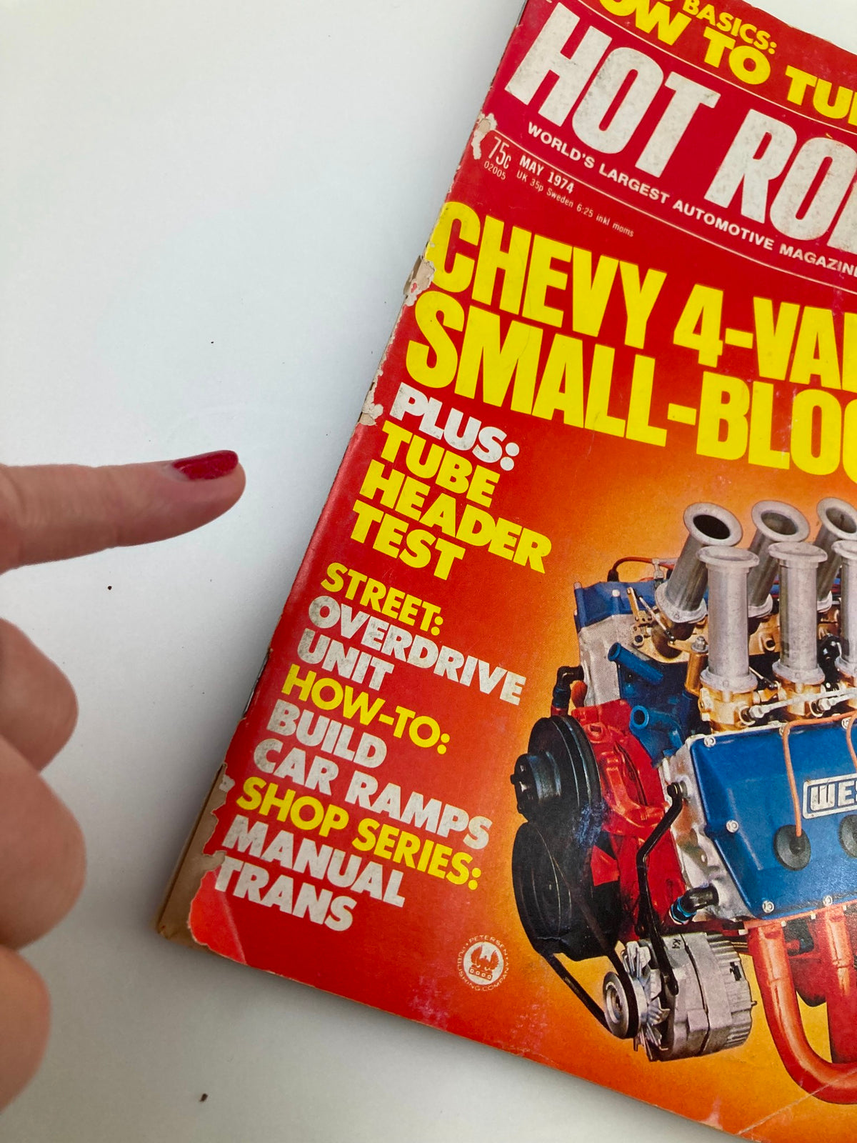 Close-up view of the cover of Hot Rod Magazine May 1974 Vol 27 #5, displaying details on Chevy 4-Valve Small-Block Heads and additional automotive topics.