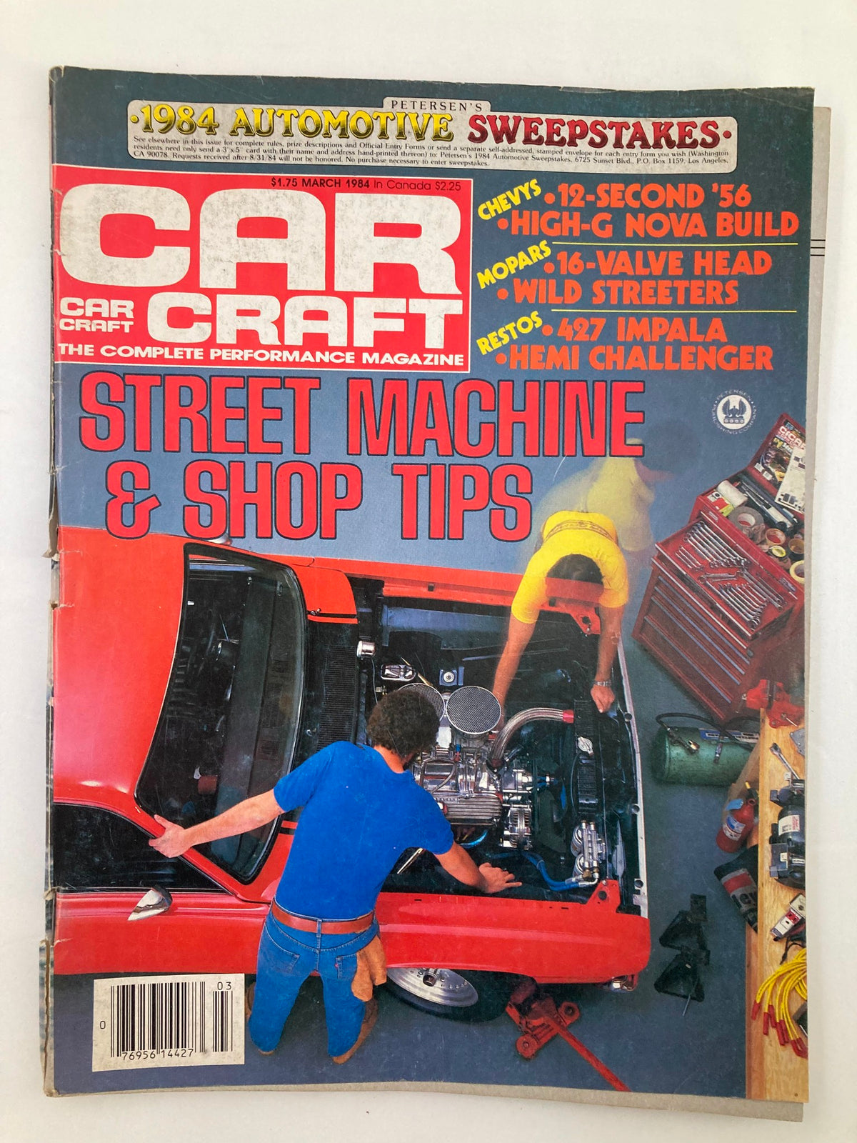 Cover of VTG Car Craft Magazine March 1984, Volume 32, Issue #3 featuring 'Street Machine & Shop Tips'. The image showcases a red vehicle with a mechanic working on the engine, emphasizing automotive craftsmanship and the culture of the 1980s.