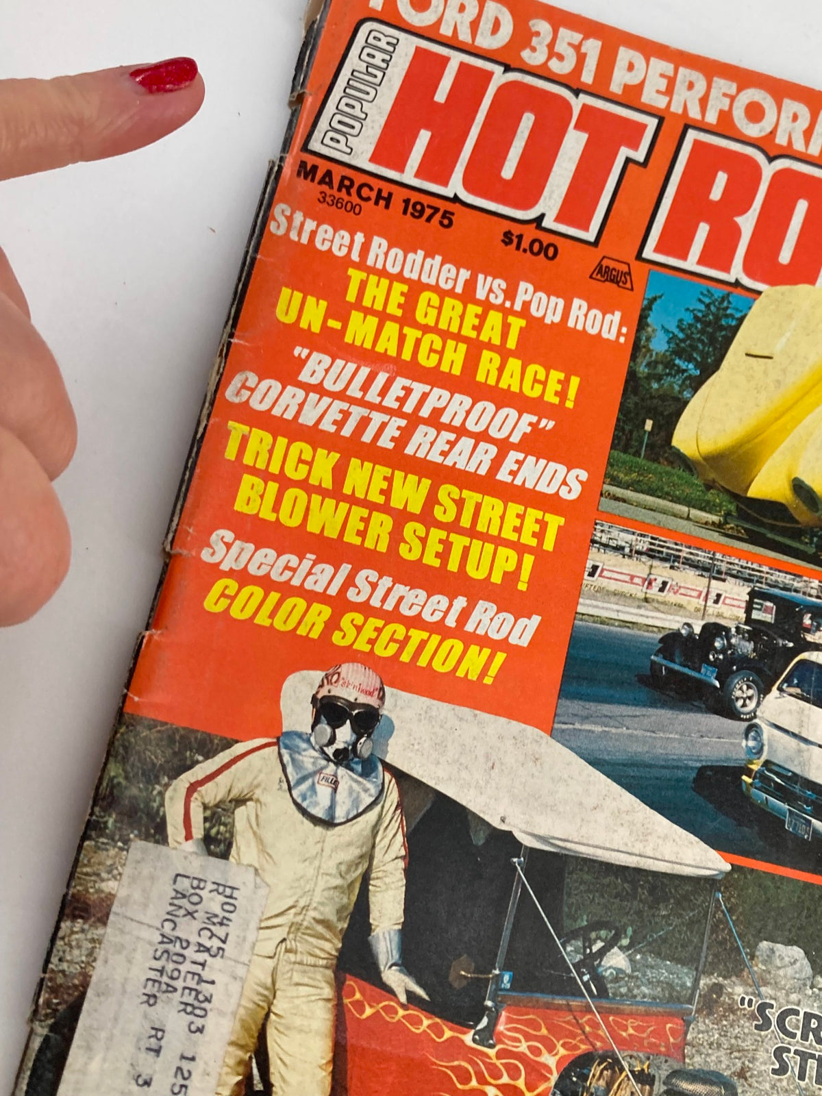 Close-up of the Popular Hot Rodding Magazine cover from March 1975, Volume 14, Issue #3, highlighting features such as 'Street Rodder vs. Pop Rod' and performance secrets.