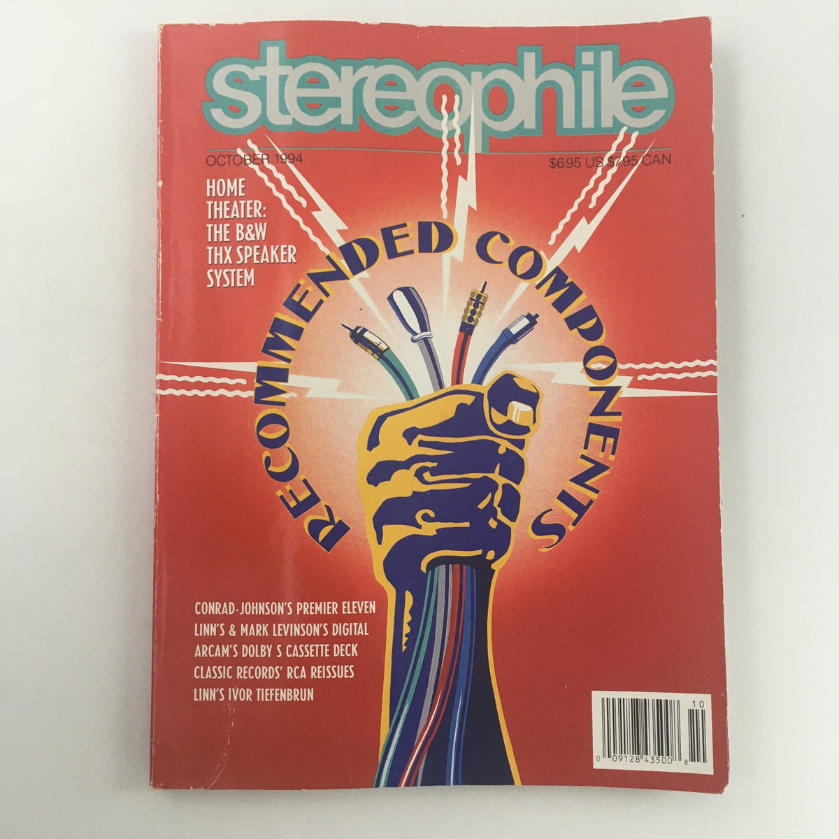 Cover of Stereophile Magazine October 1994 featuring an illustration of a hand holding audio cables, highlighting Conrad-Johnson's Premier Eleven, with articles on home theater systems and recommended components.