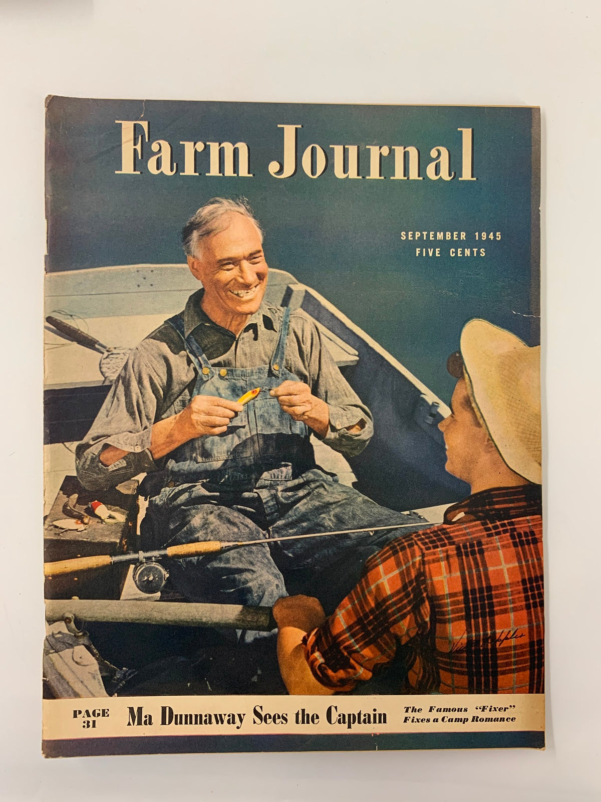 VTG Farm Journal Magazine September 1945 cover featuring the article 'Ma Dunaway Sees The Captain', showcasing two men on a boat, one fishing and the other smiling, embodying mid-20th century agricultural life.