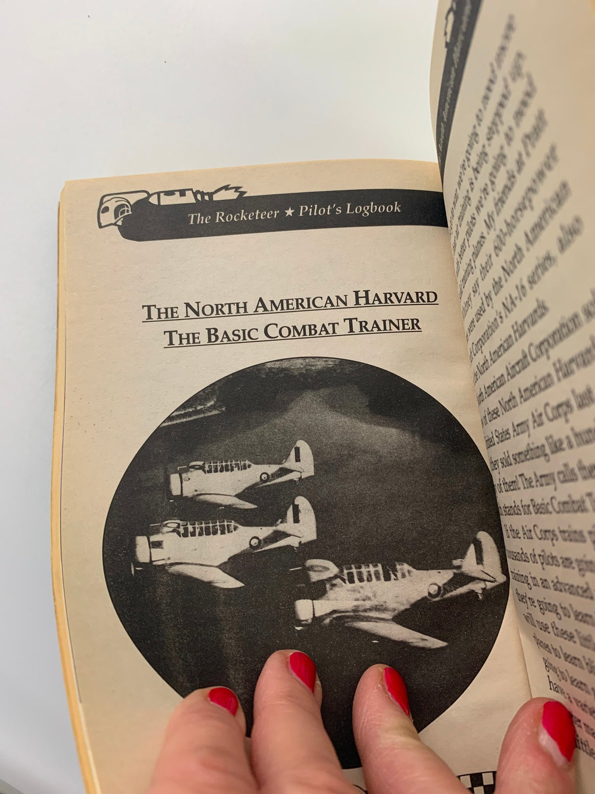 Interior page of Walt Disney The Rocketeer Pilot's Logbook featuring The North American Harvard Basic Combat Trainer with detailed illustrations and text about its significance.