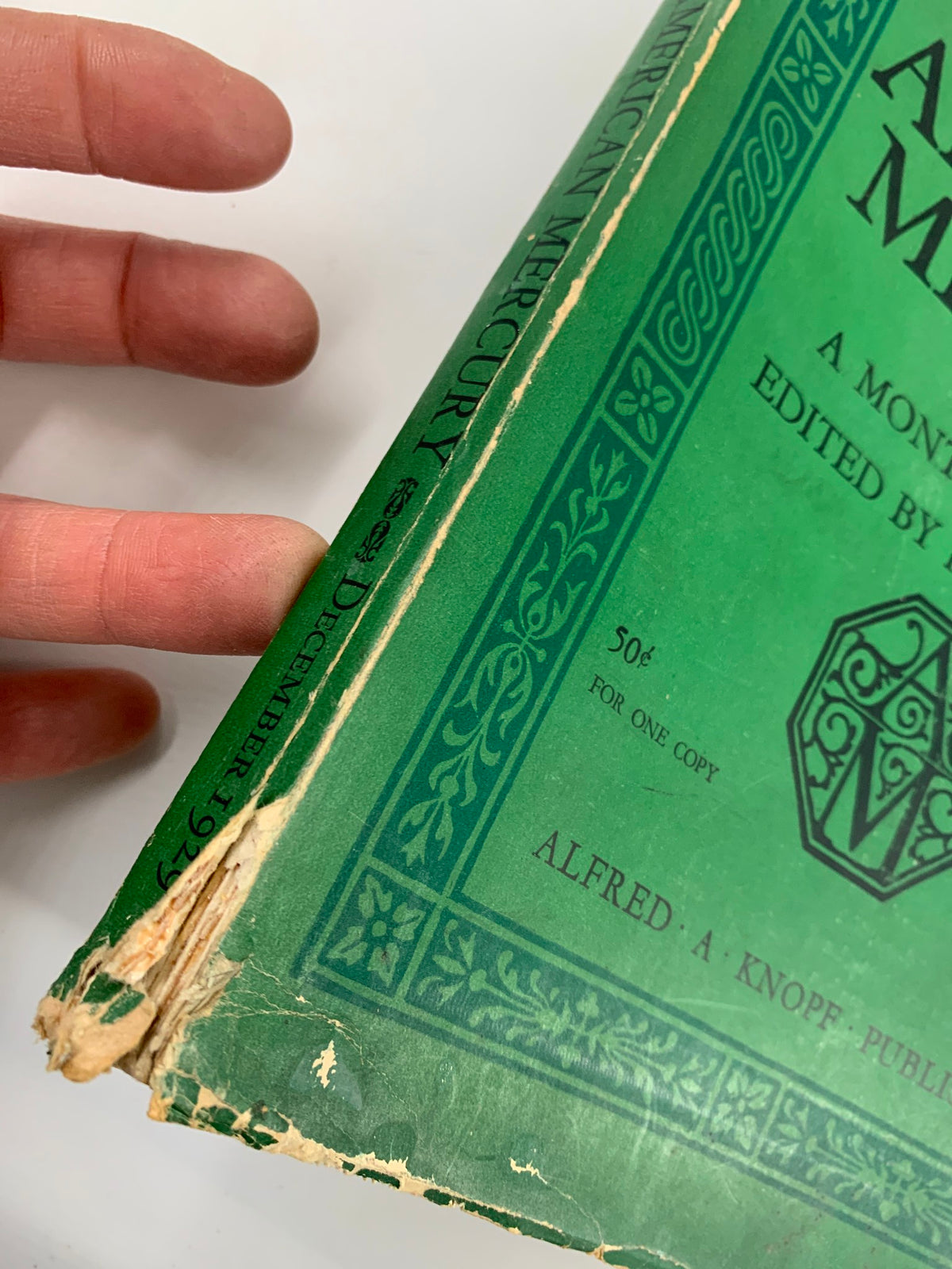 Spine view of VTG The American Mercury Magazine December 1929 The Secretariat, highlighting its condition with visible wear and aging.