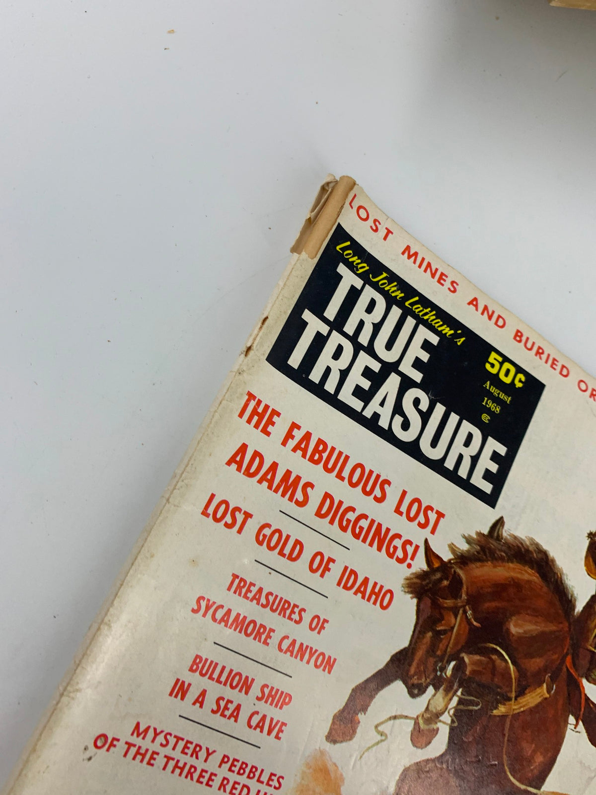 Close-up of the cover of VTG True Treasure Magazine August 1968 emphasizing the title 'True Treasure' and the subtitle 'The Fabulous Lost Adam Diggings'.