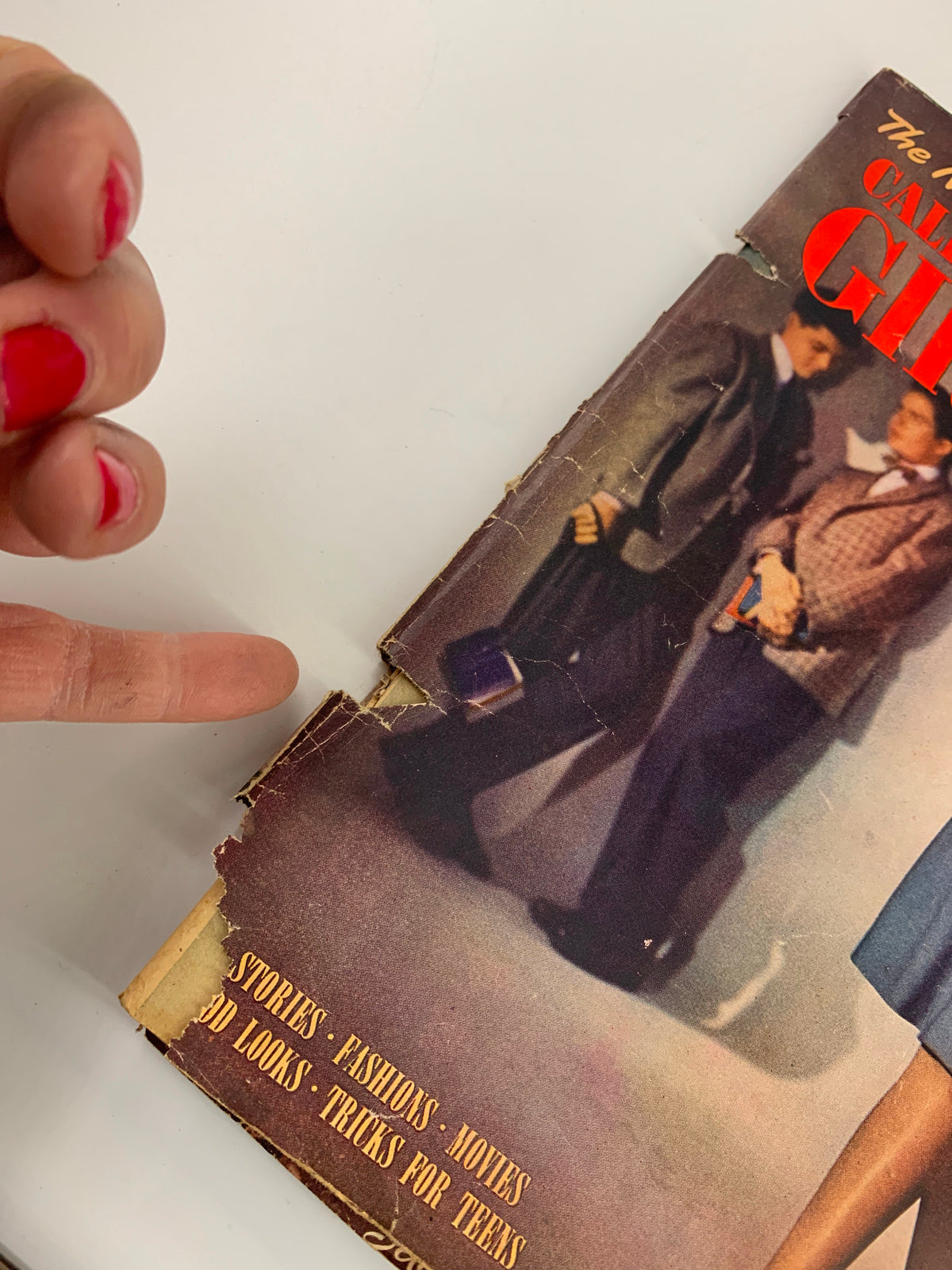 Close-up of the edge of the VTG Calling All Girls Magazine September 1946, highlighting minor wear and tear that adds character to this historical publication.