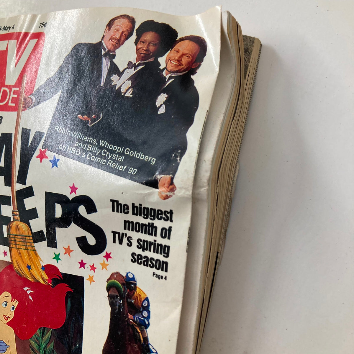 Cover page of TV Guide Magazine dated April 28, 1990 featuring iconic comedians Robin Williams, Whoopi Goldberg, and Billy Crystal with the headline 'The biggest month of TV's spring season.'