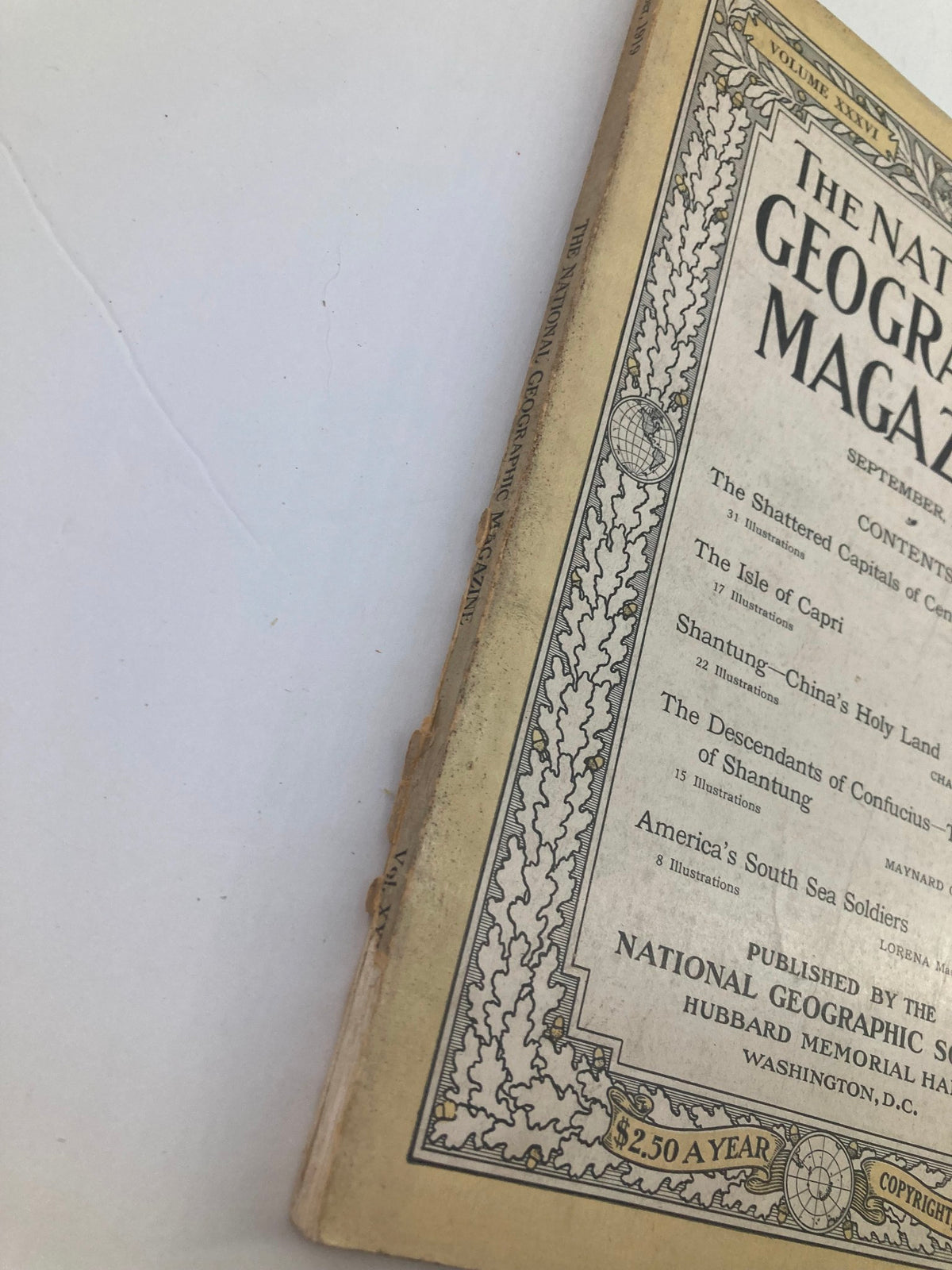 Side view of the vintage National Geographic Magazine from September 1919, showing signs of wear on the spine and edges.