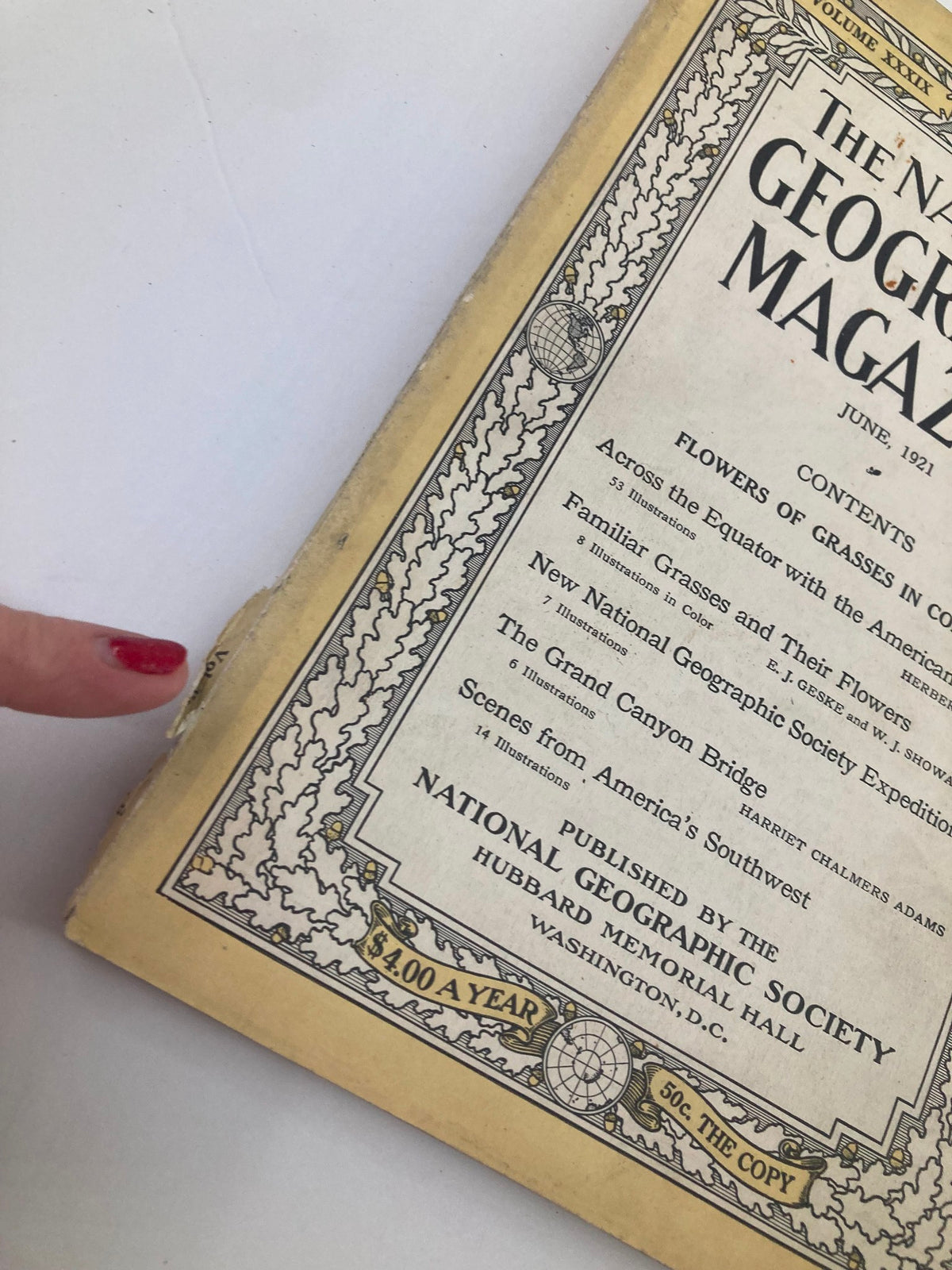 Close-up view of the spine of VTG The National Geographic Magazine June 1921, highlighting physical wear and tear on the edges.