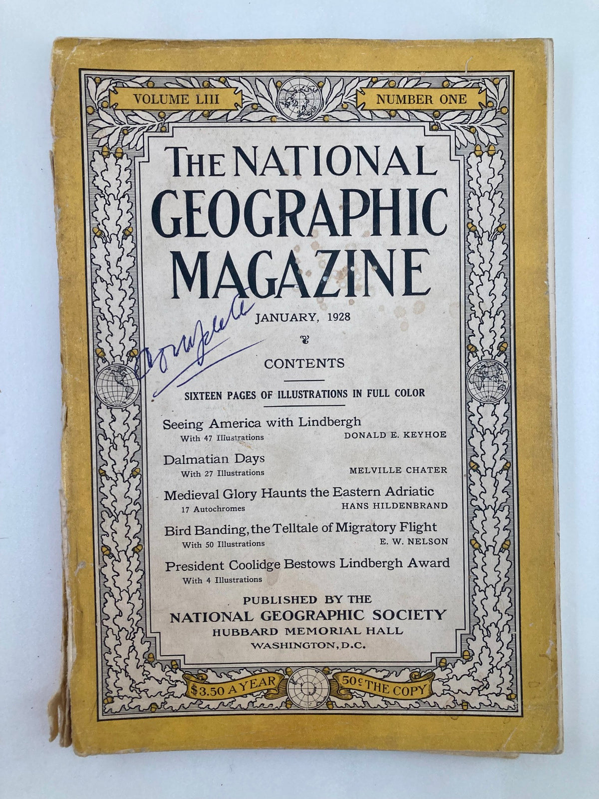Cover page of the vintage National Geographic Magazine from January 1928 titled 'Dalmatian Days', featuring yellowed pages and original contents.