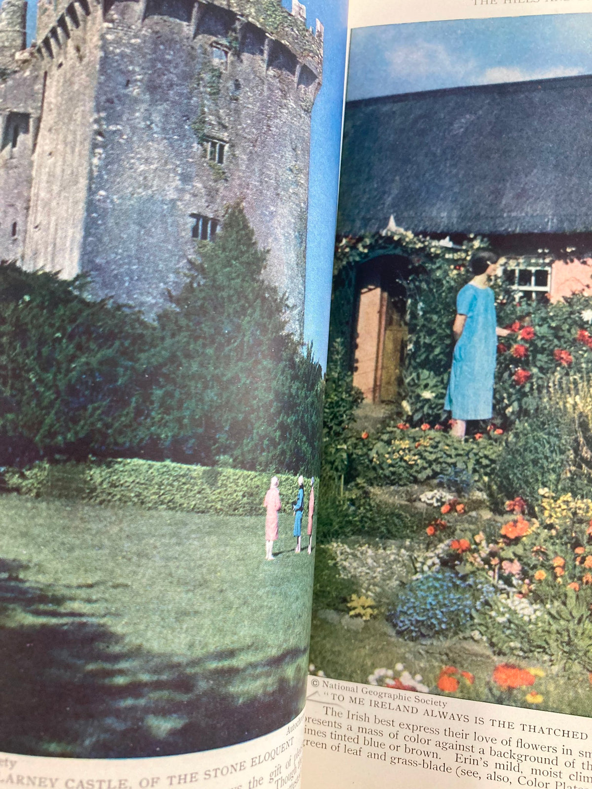 Image from VTG The National Geographic Magazine March 1927 featuring a picturesque scene of a castle with children and vibrant flowers illustrating the Green Mountain State.