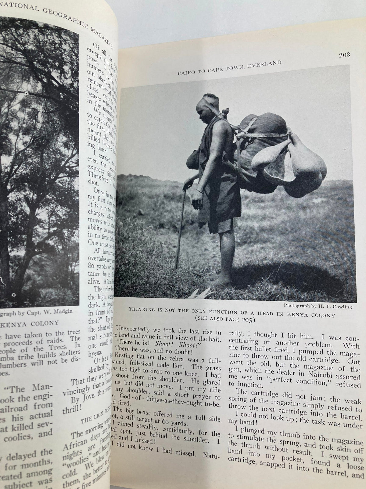 Inside page of VTG The National Geographic Magazine February 1925 with the article 'Cairo to Cape Town' showing a photograph of a local person carrying goods with a scenic background.