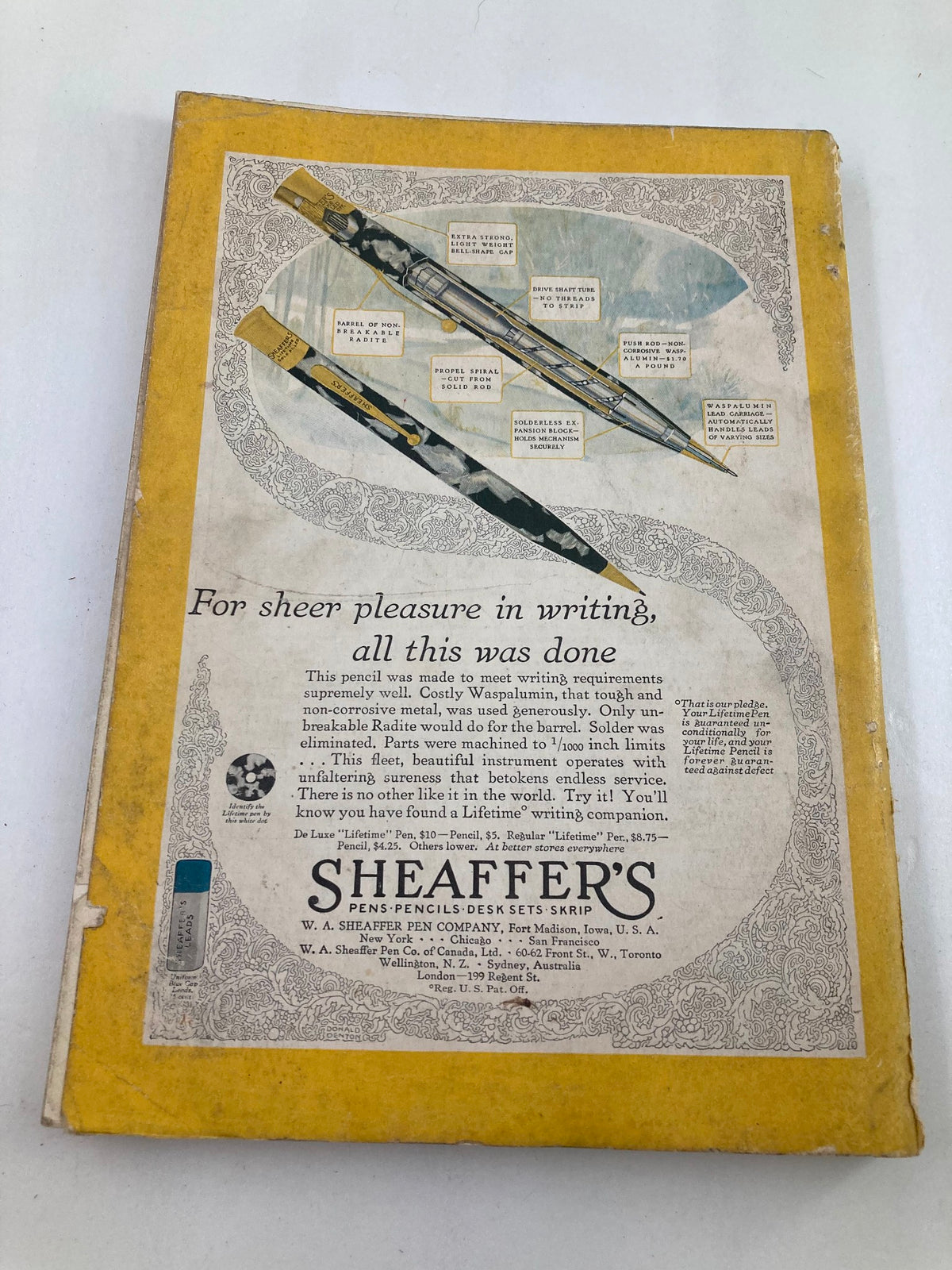 Back cover of the Vintage National Geographic Magazine February 1929 featuring an advertisement for Sheaffer's writing instruments, reflecting the design trends of the era.
