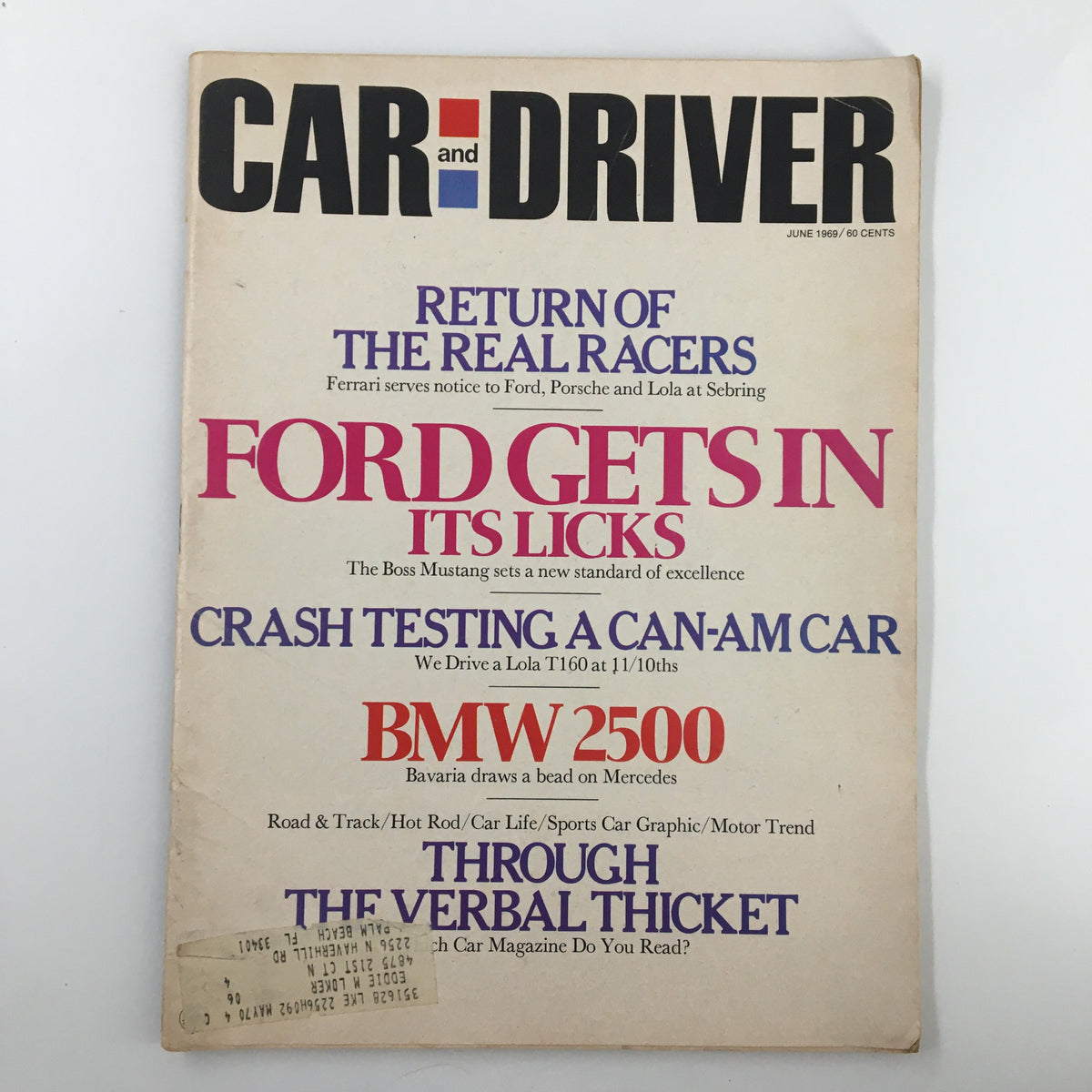 Cover of Car and Driver Magazine from June 1969 titled 'Return of The Real Racers & Ford Gets In', featuring articles on racing and Ford's automotive advancements.
