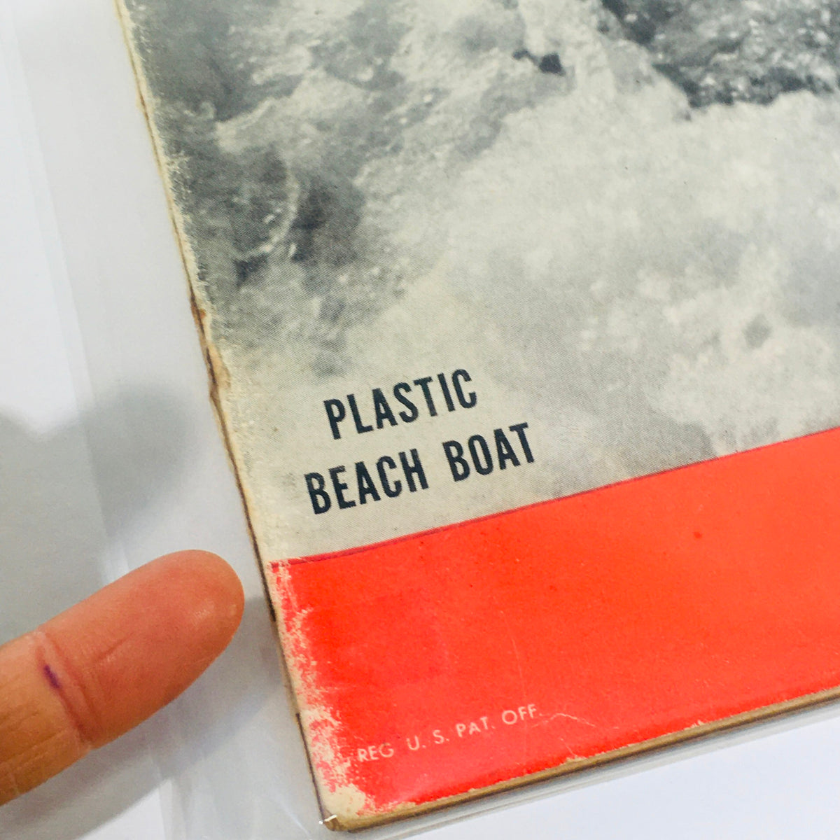 Close-up view of the Life Magazine cover text on plastic beach boat from the July 25, 1949 issue, showcasing vintage advertising style.