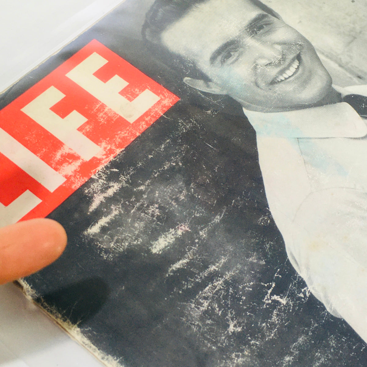 Close-up of the Life Magazine cover from November 21, 1949, showcasing Ricardo Montalban with details of wear consistent with aging, preserving the historic charm.