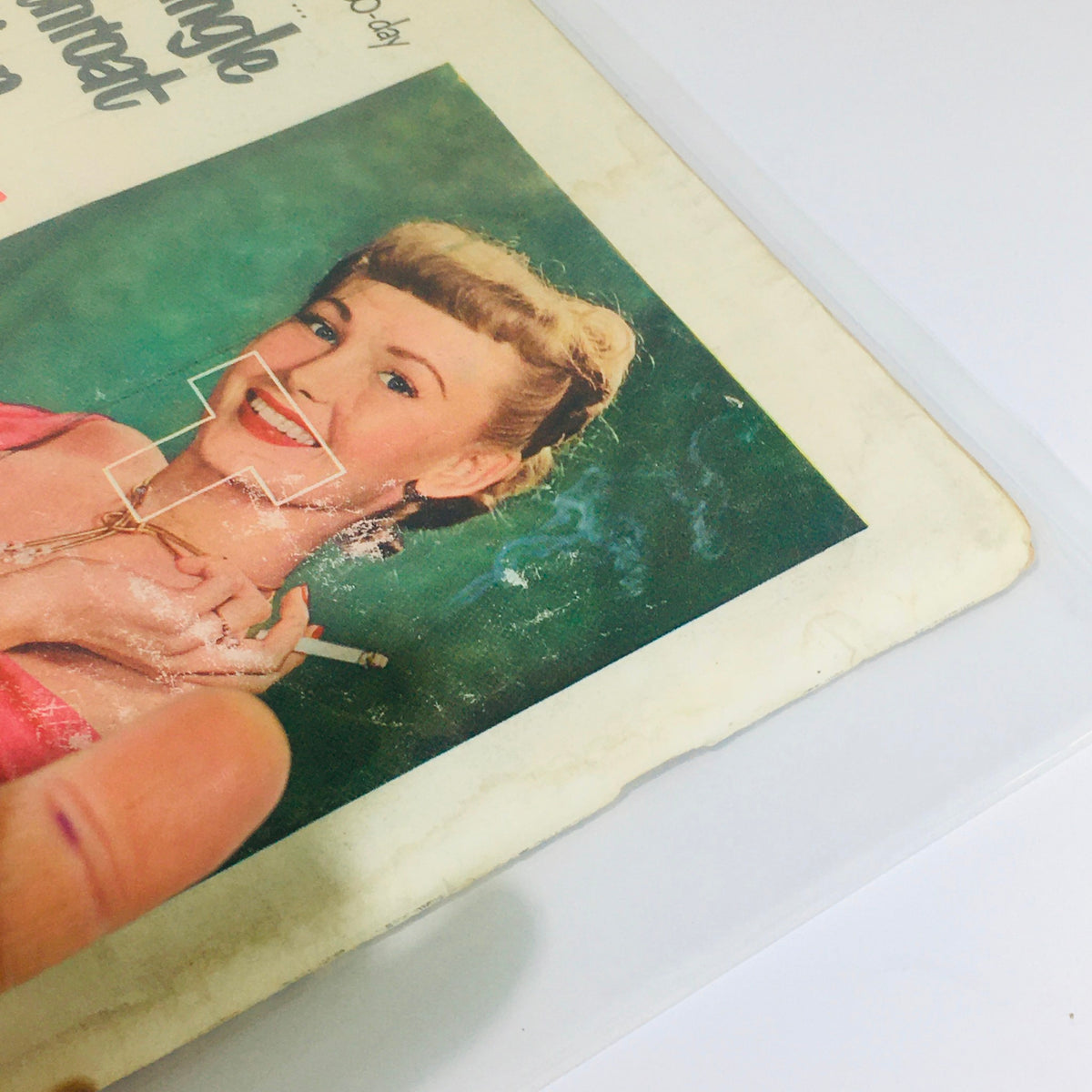Another angle of the back cover of VTG Life Magazine: Nov 21 1949 highlighting a woman holding a cigarette, promoting Camel cigarettes with a cheerful expression.