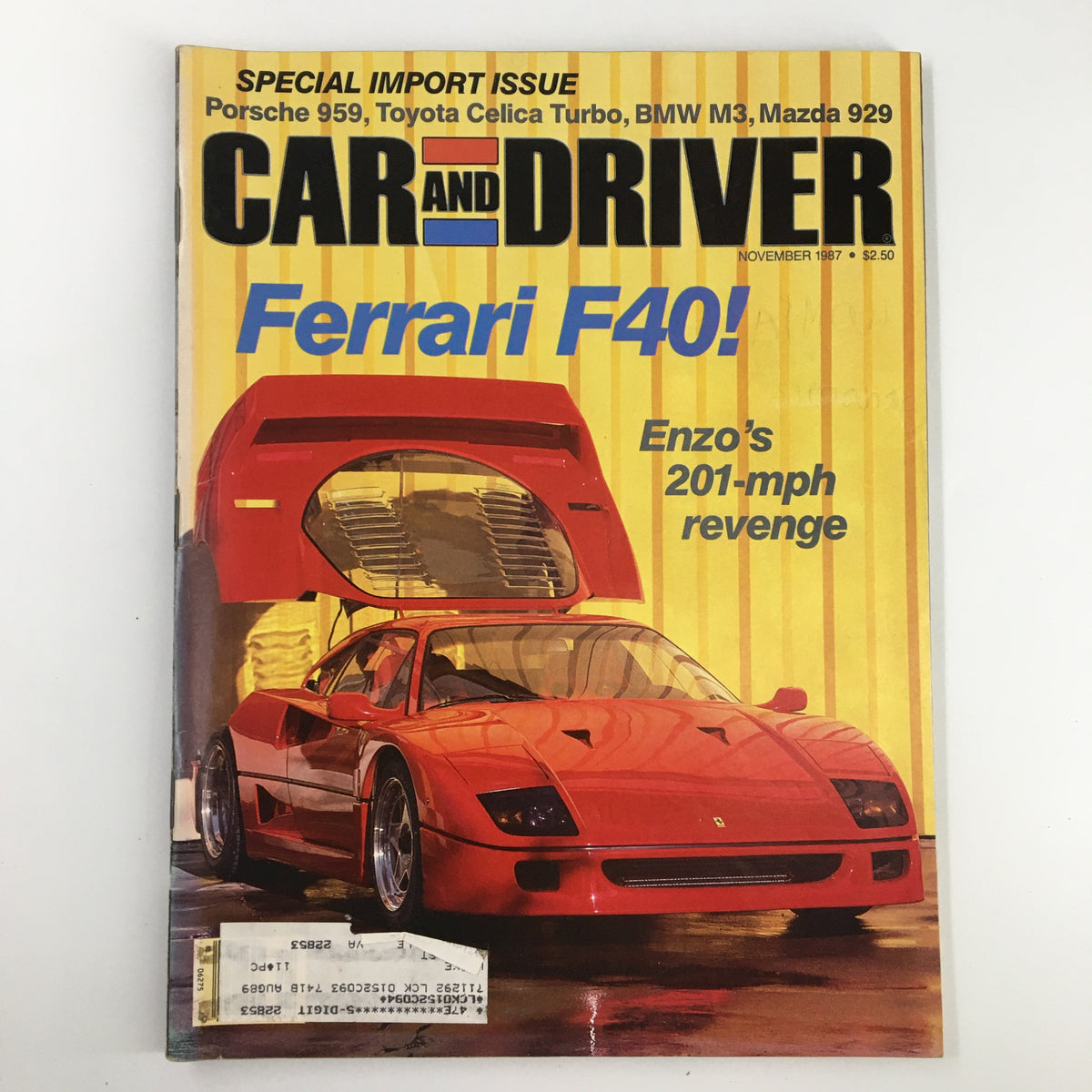 Car and Driver Magazine November 1987 featuring Ferrari F40 on the cover, showcasing the headline 'Enzo's 201-mph revenge,' highlighting the performance and design of this iconic sports car.