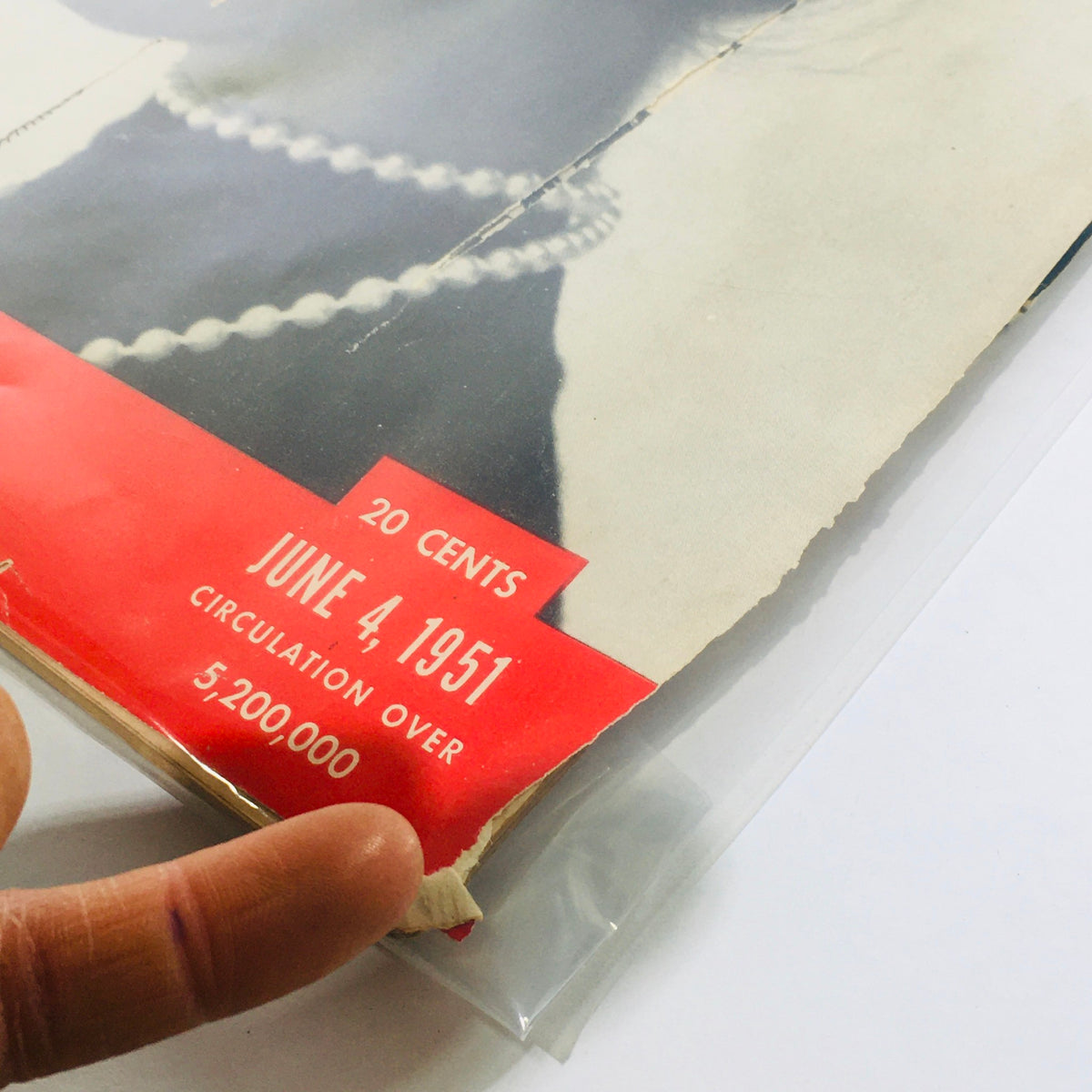 Close-up of June 4, 1951, Life Magazine cover showing the date and price, featuring the title 'VTG Life Magazine: June 4 1951 - Rising German Model/Red Attack/Tito Recovers' with signs of wear.