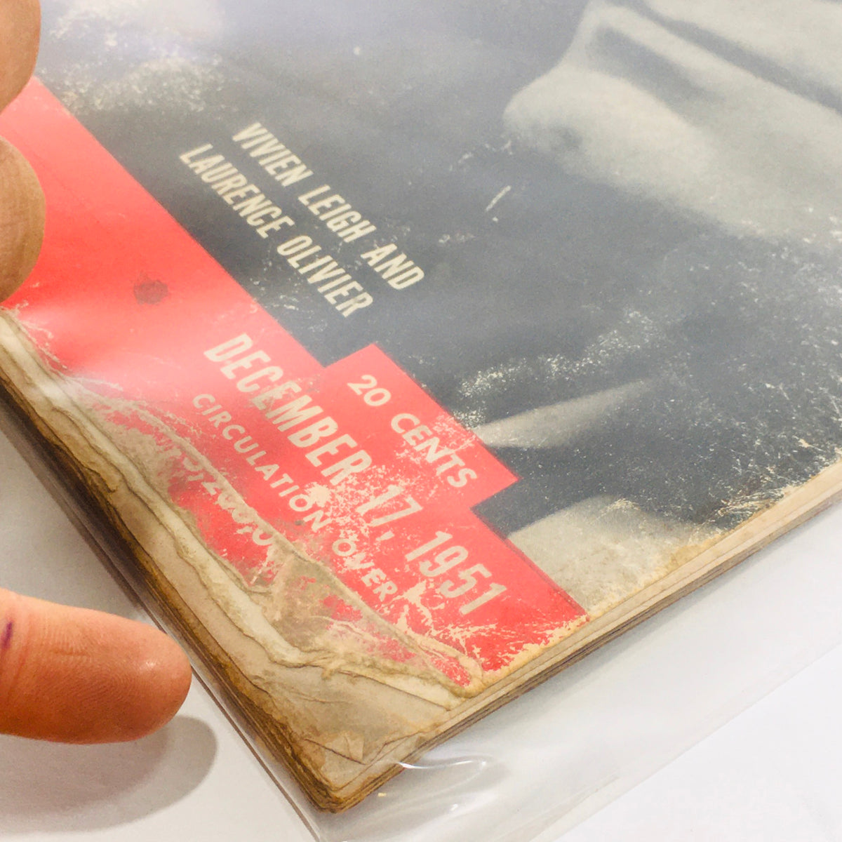 Detailed view of the bottom corner of VTG Life Magazine: Dec 17 1951, showcasing the publication date and price along with signs of age-related wear.