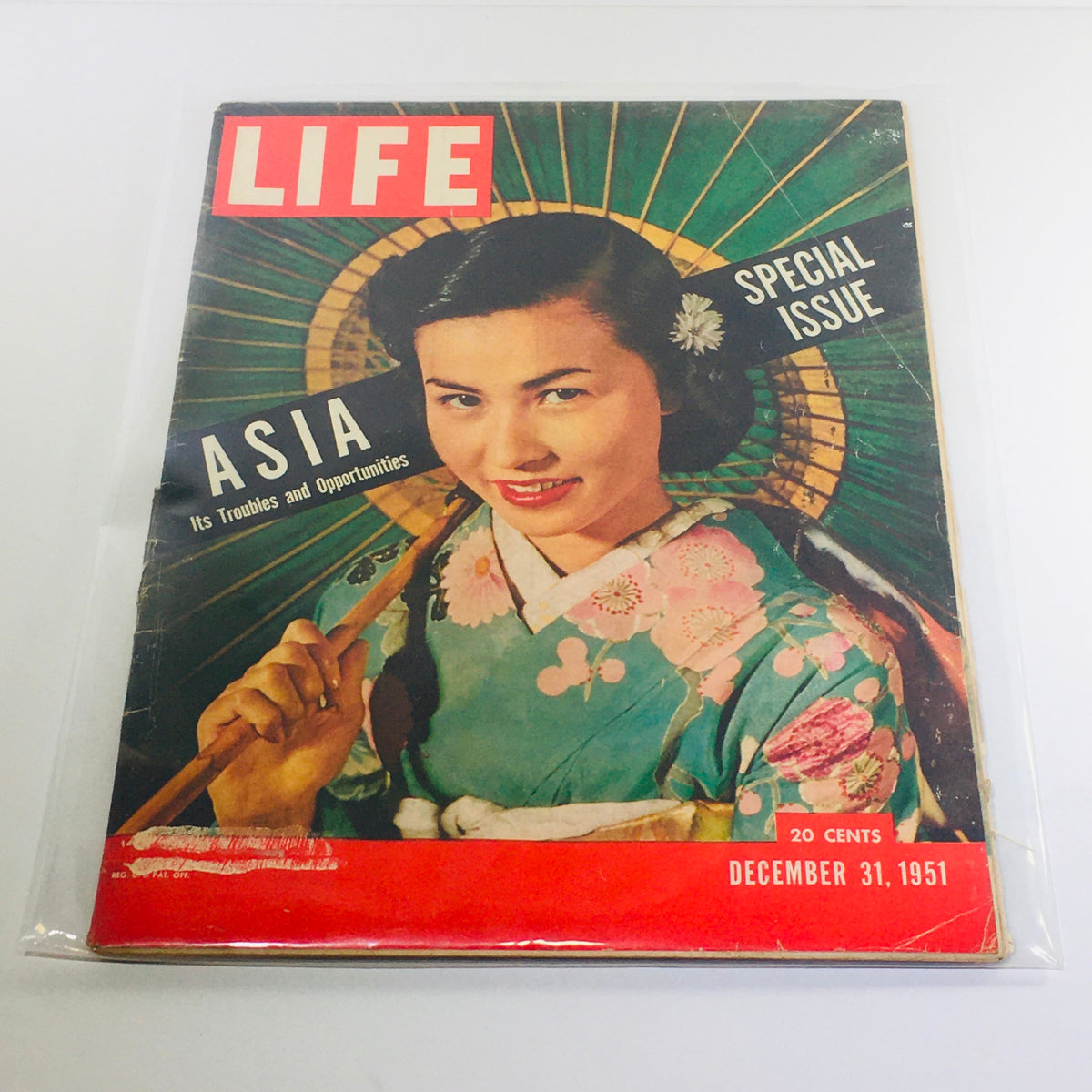 Cover of VTG Life Magazine dated December 31, 1951, featuring the title 'Asia: Its Troubles & Opportunities' with a woman in traditional dress and a decorative fan in the background.