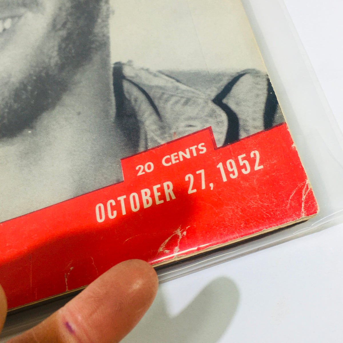 Close-up image of the Vintage Life Magazine dated October 27, 1952, highlighting the date and price, showcasing John Lindbergh.