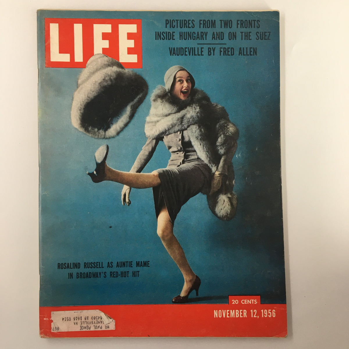 Cover of VTG Life Magazine from November 12, 1956 featuring Rosalind Russell as Auntie Mae in a fashionable outfit, symbolizing the glamour of the era.