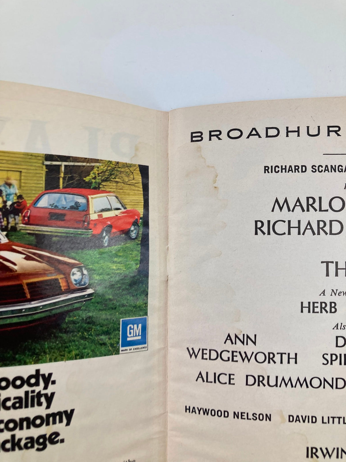 Close-up of the 1974 Playbill section showing production details for 'Thieves' starring Marlo Thomas and Richard Mulligan, with a vintage photograph of a car.