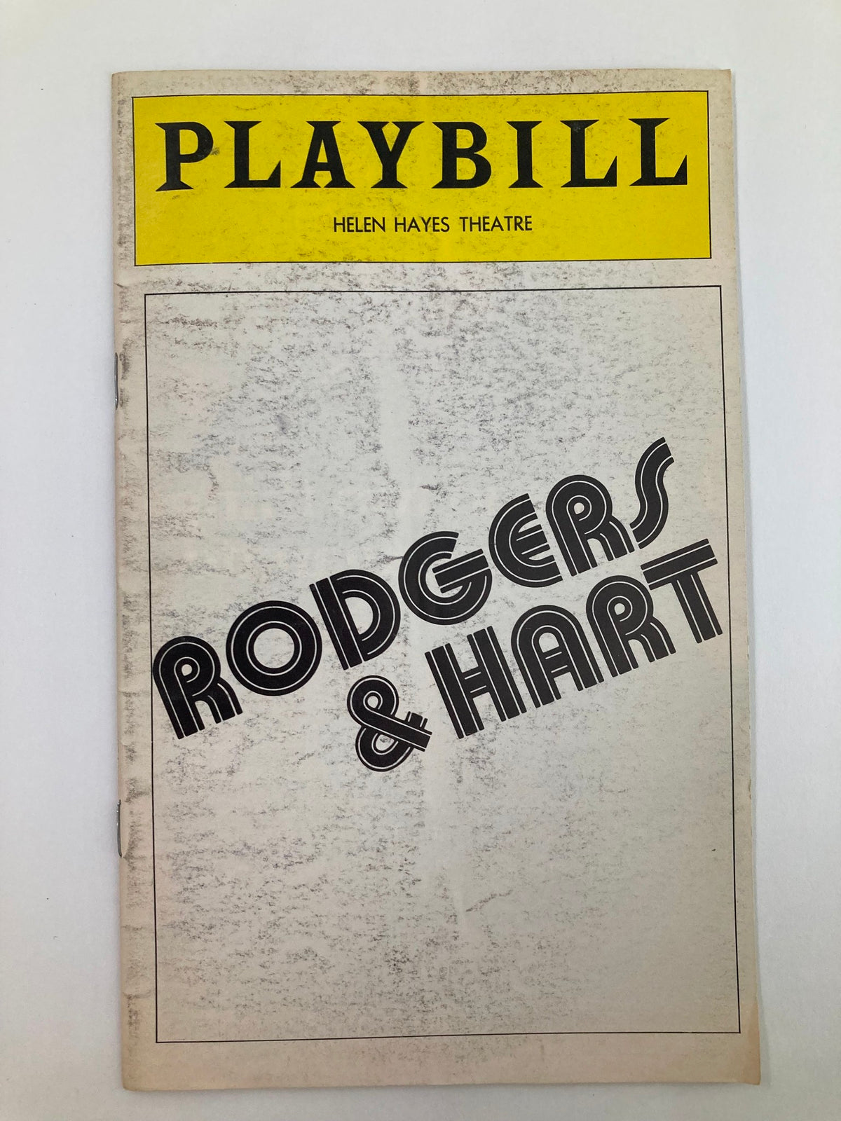 1975 Playbill Helen Hayes Theatre showcasing the title 'Rodgers & Hart' in bold lettering, reflecting the vintage design of Broadway programs.