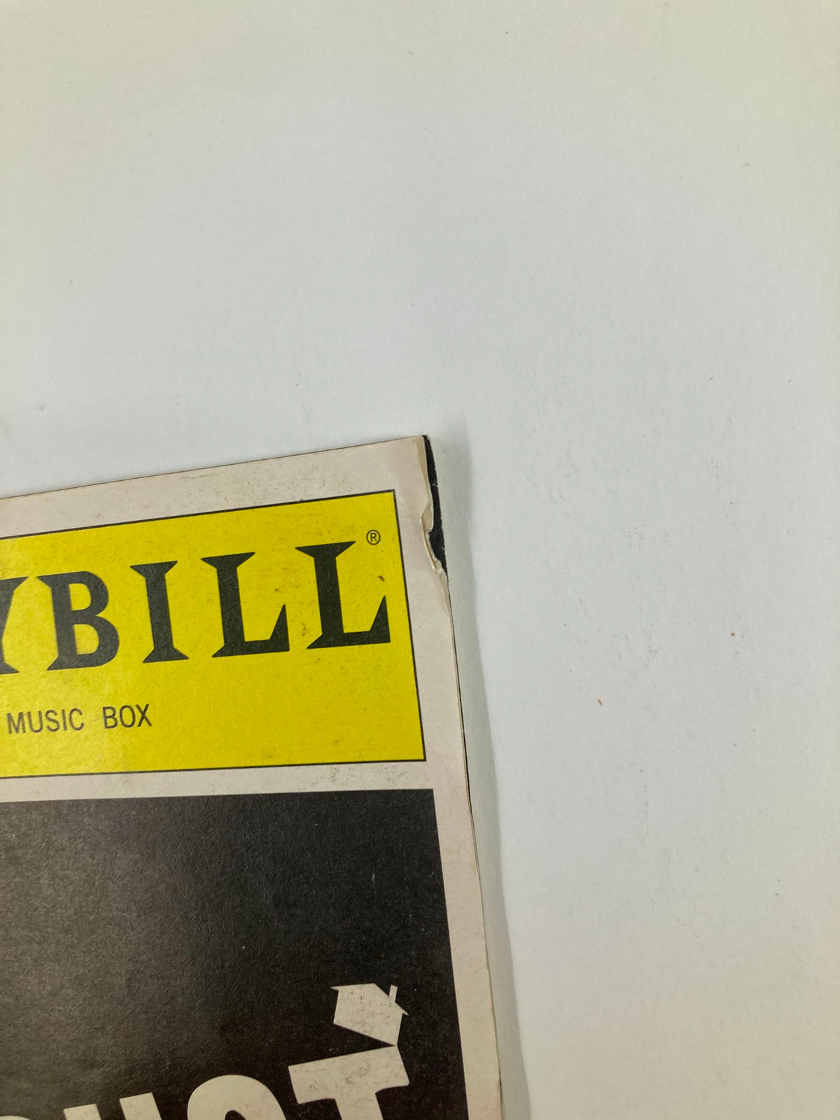 Close-up view of the 2008 Playbill for August: Osage County, highlighting minor wear on the top corner.