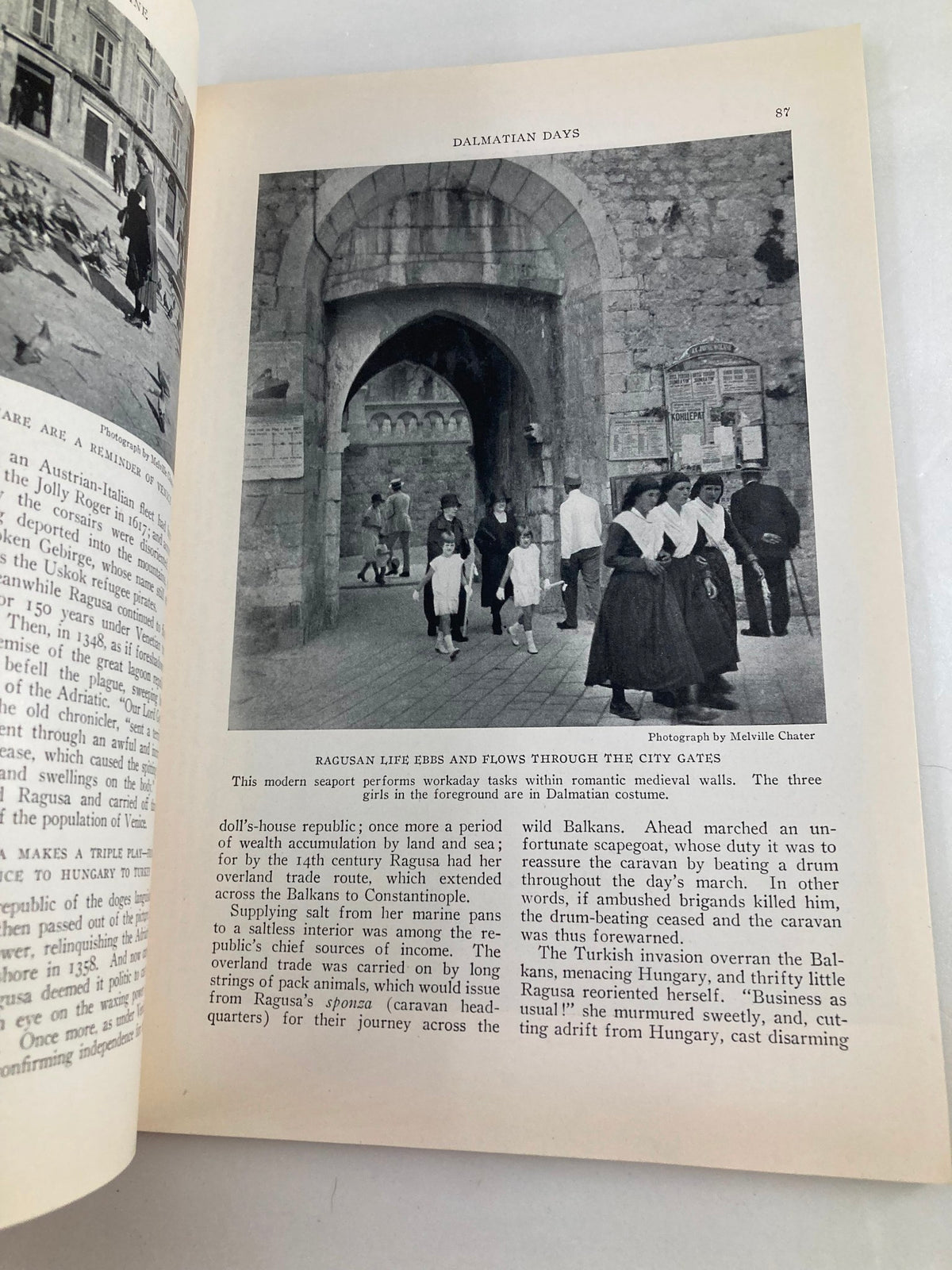 Page from The National Geographic Magazine January 1928 displaying a snapshot of life in the Balkans, emphasizing the blend of modernity and tradition in daily activities.
